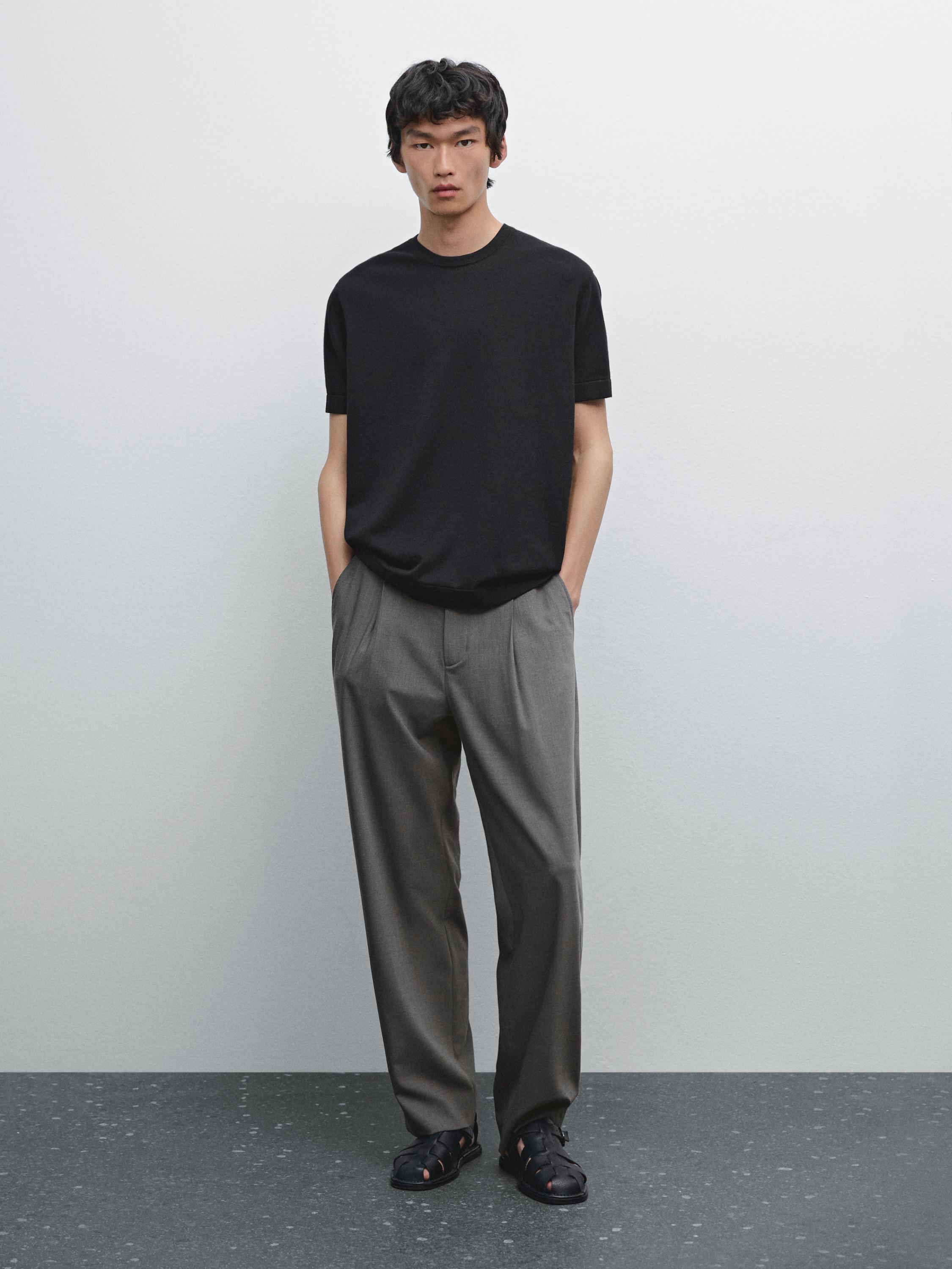 Relaxed fit trousers with darts detail
