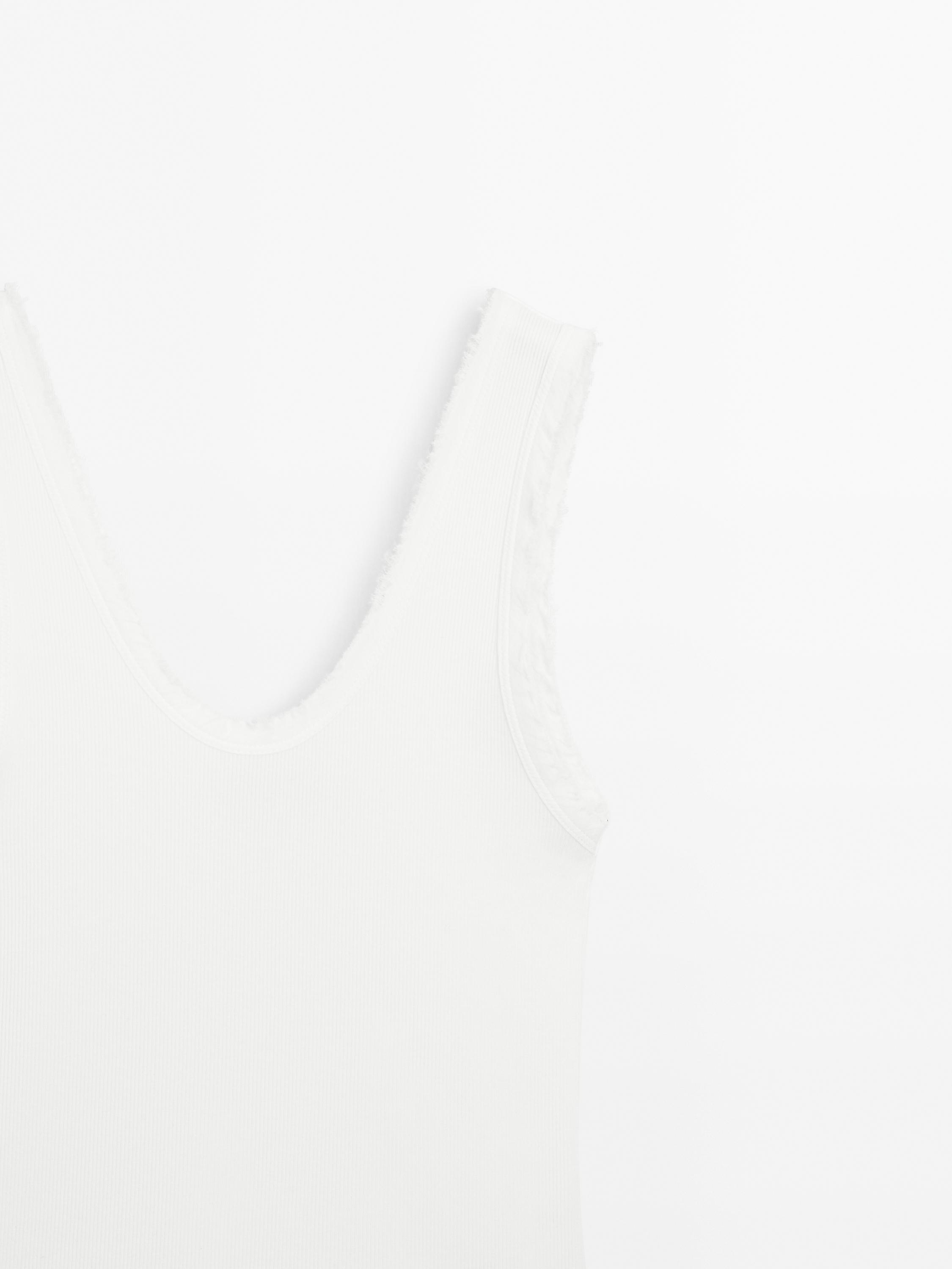 Cotton blend top with frayed piping