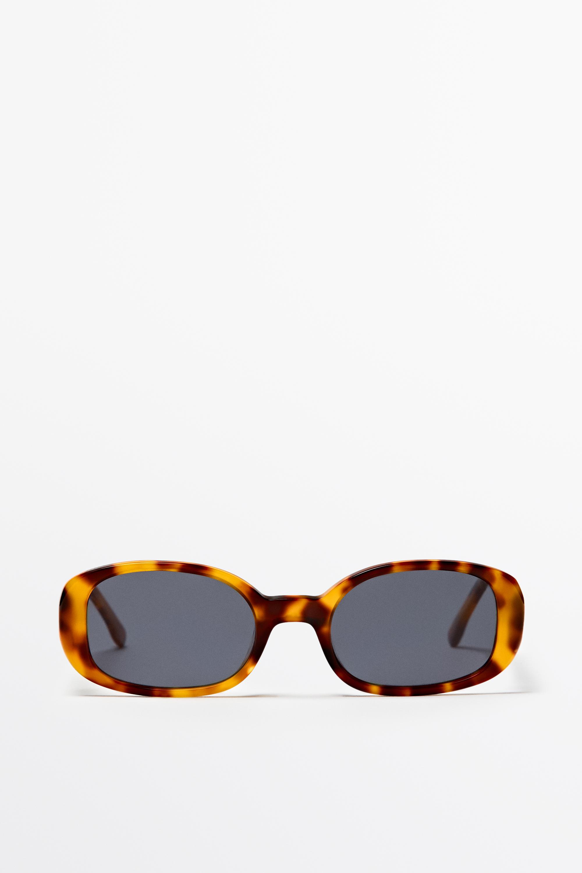 Oval tortoiseshell-effect sunglasses — Light Blue