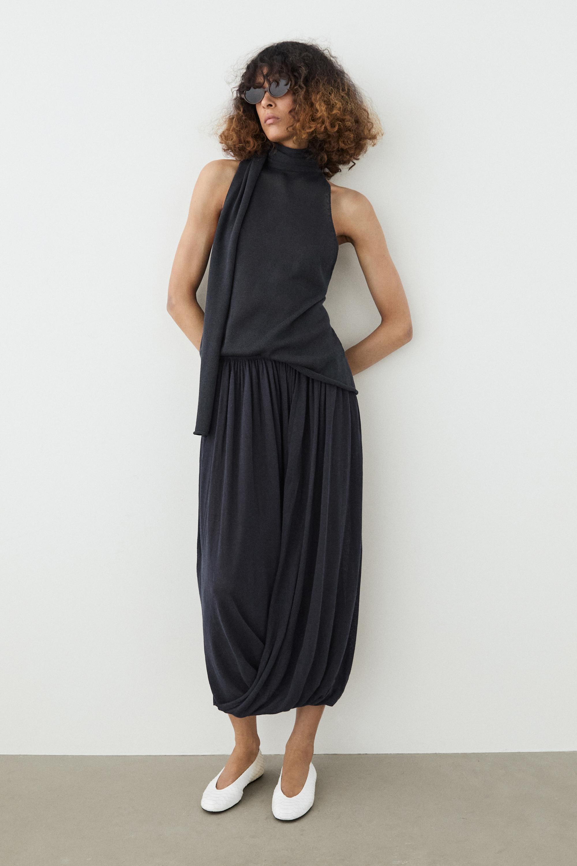 Flowing halter top with tie