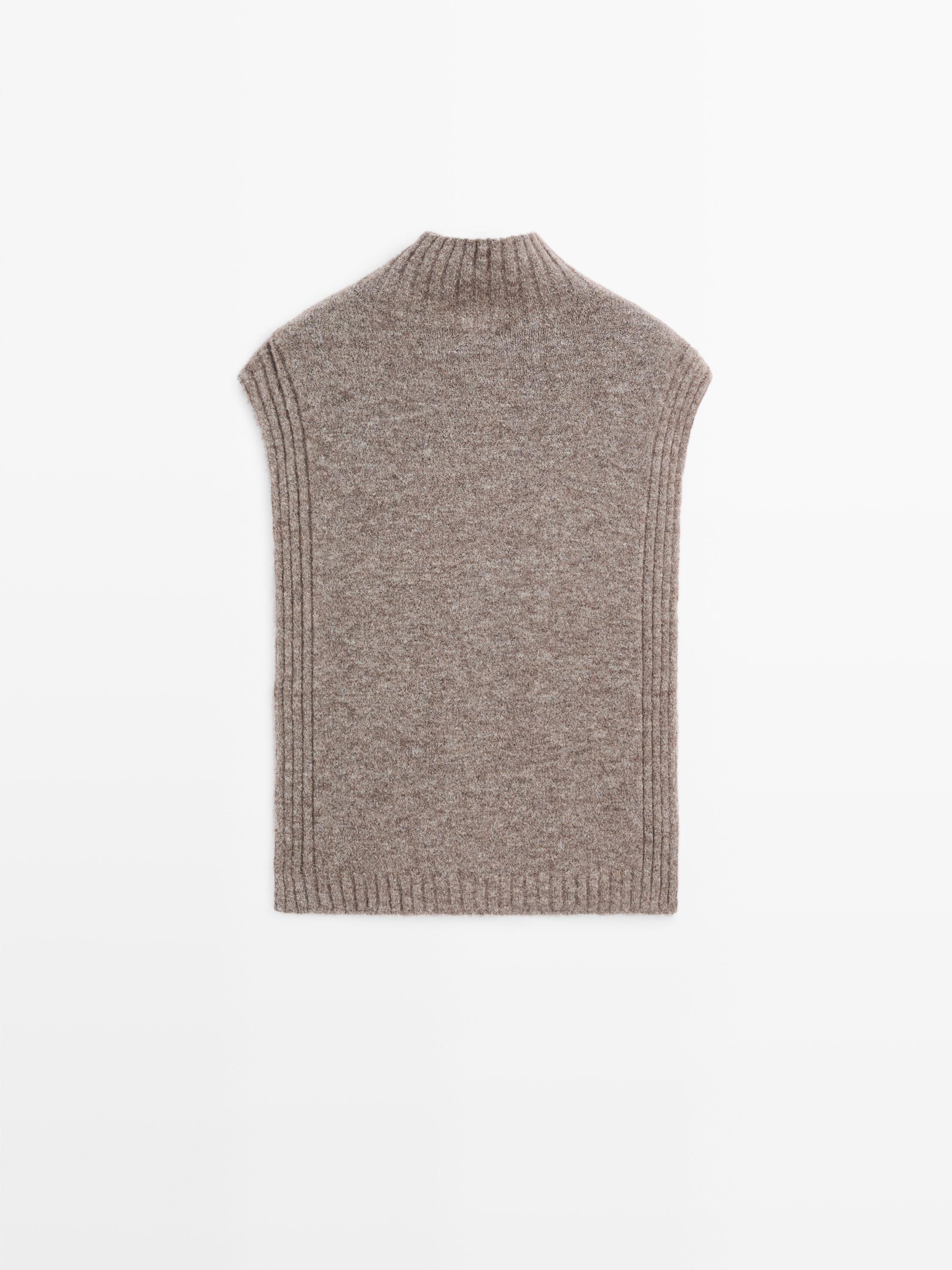 Sleeveless high neck sweater