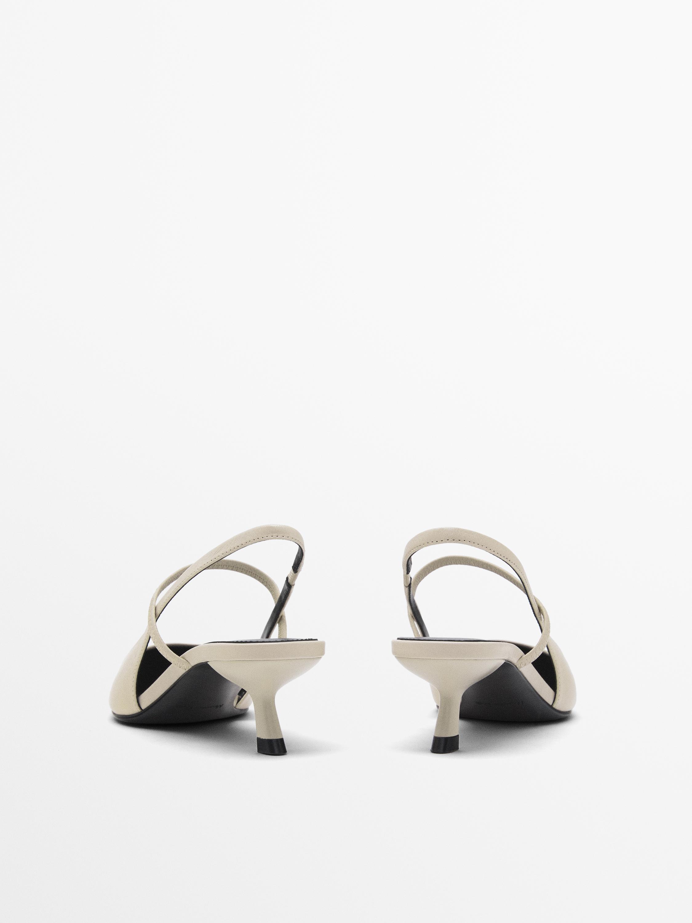 Mules à talon avec élastique sur l’empeigne