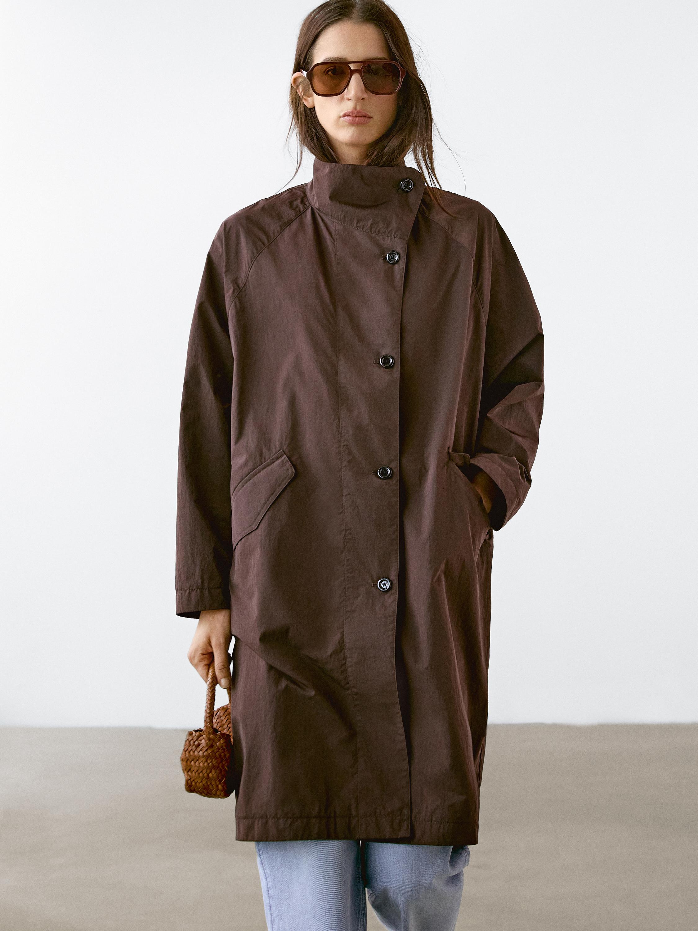 Oversize flowing trench coat in water-repellent fabric