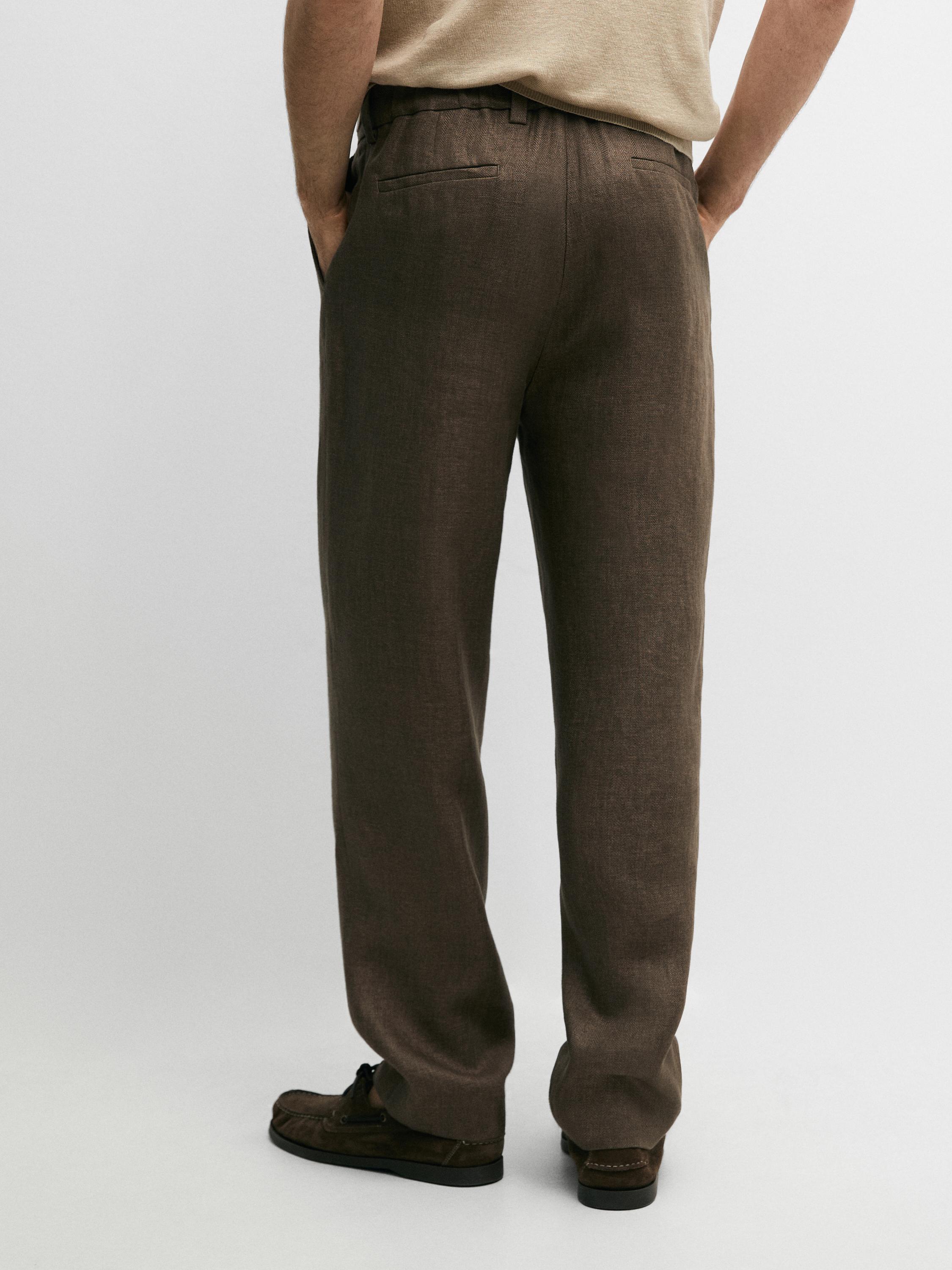 Total look linen trousers with herringbone detail — OCHRE