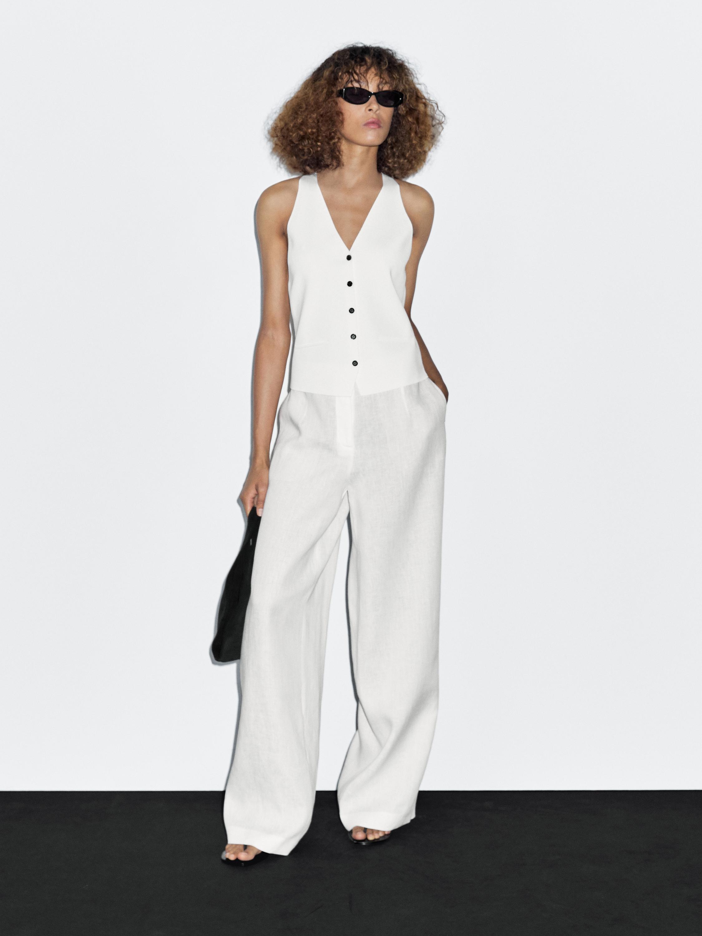 Veste sans manches en maille boutons contrastants · Blanc · Vestes Massimo Dutti