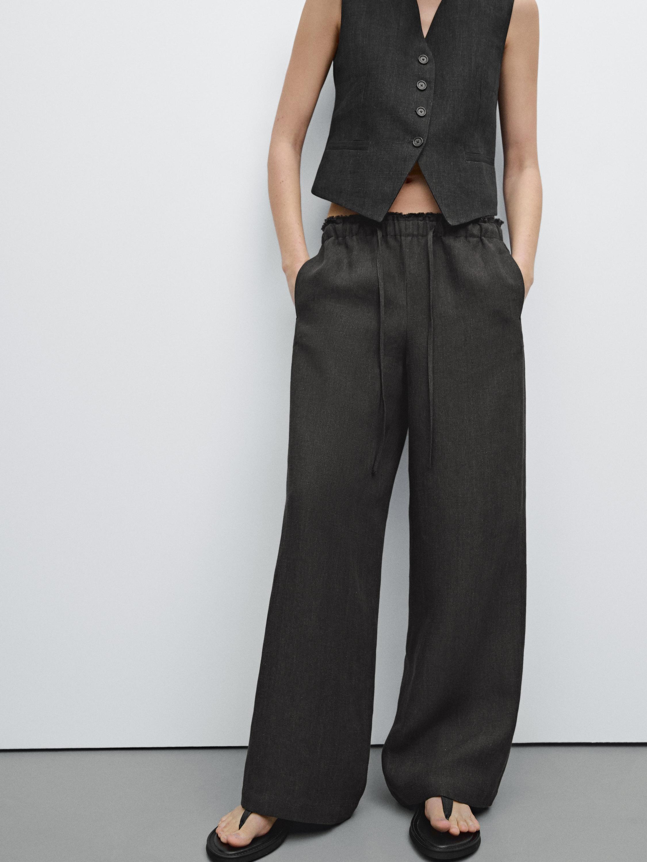 Linen suit trousers with frayed detail