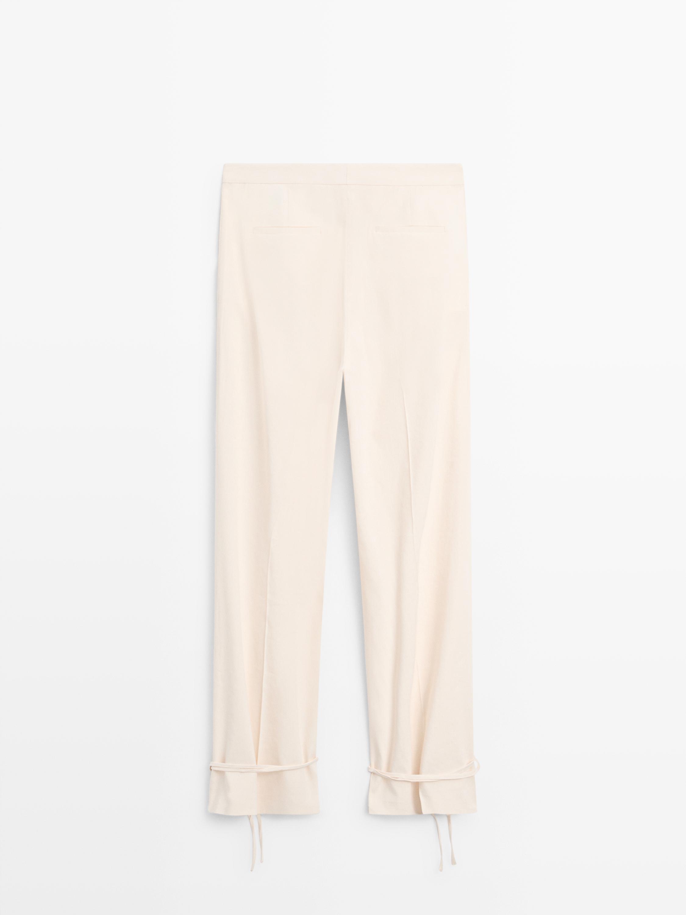 Flowing barrel fit trousers — CREAM