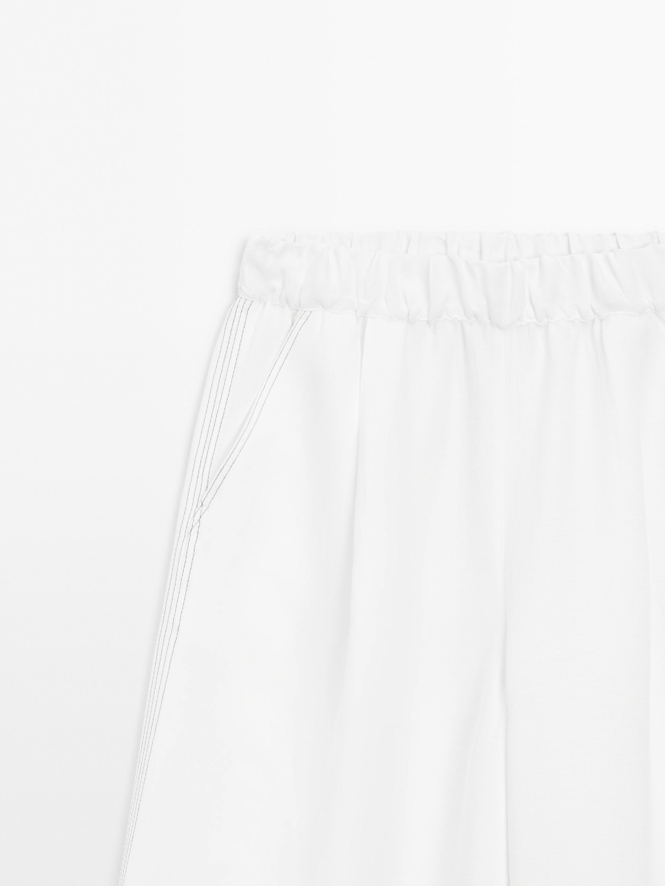 Wide-leg trousers with contrast topstitching
