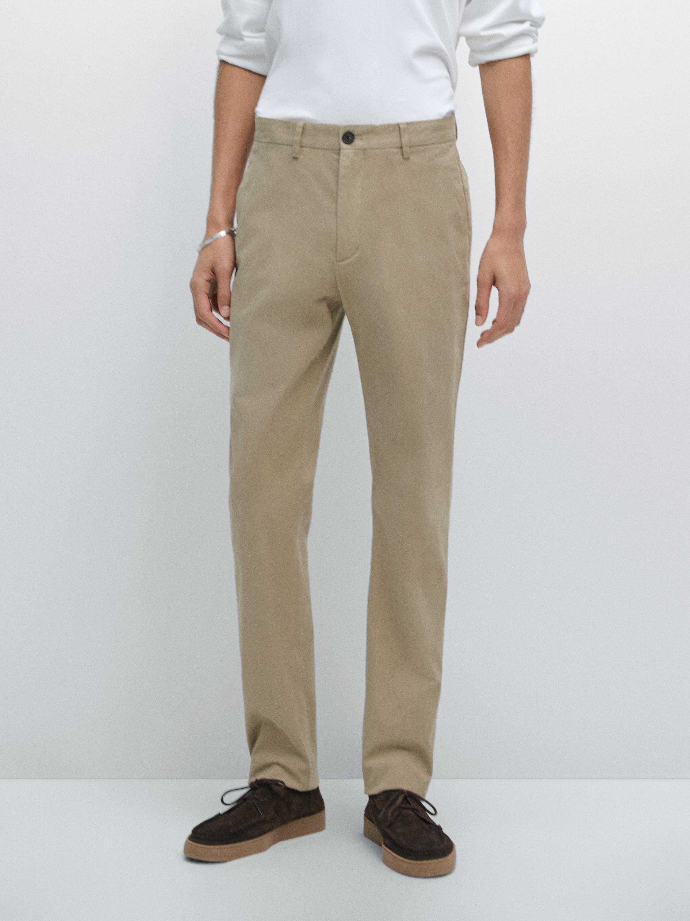 Pantalón slim fit 100% algodón