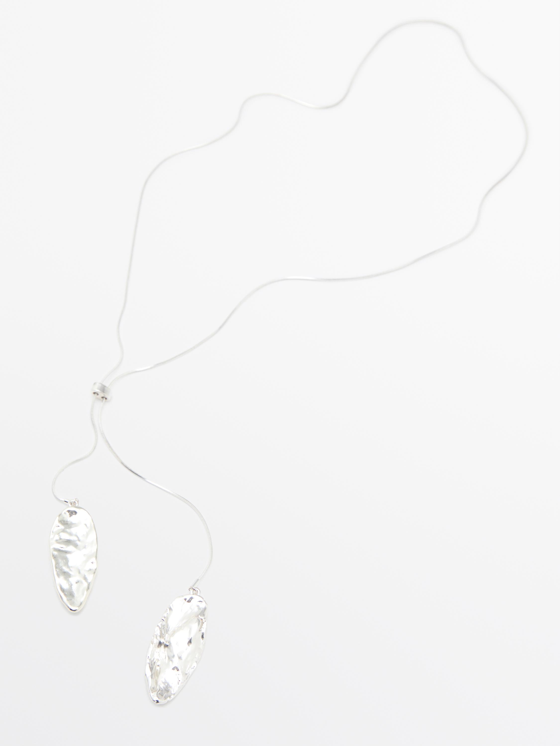 Adjustable necklace with textured pieces