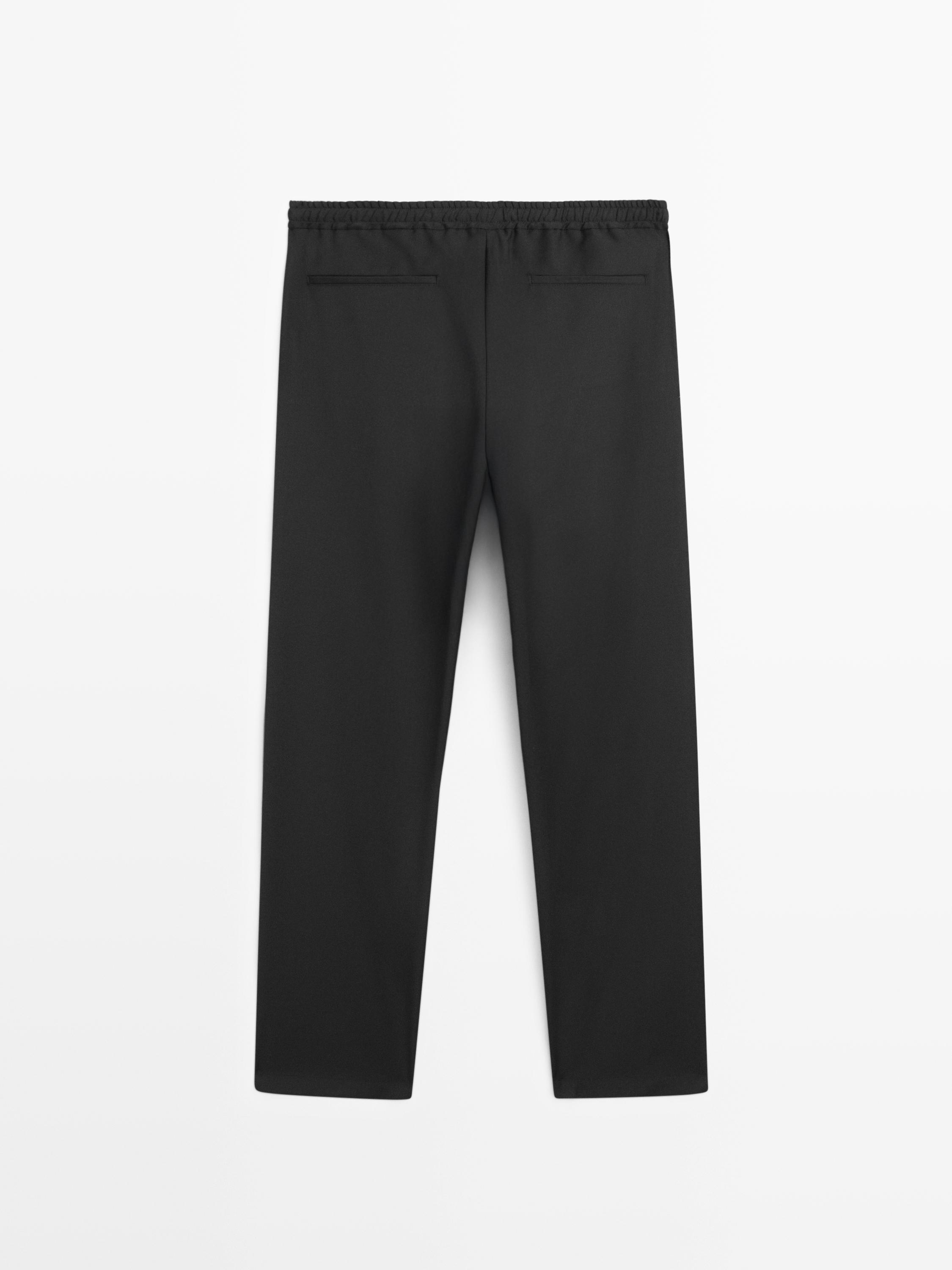 Relaxed fit 100% wool trousers — BLACK