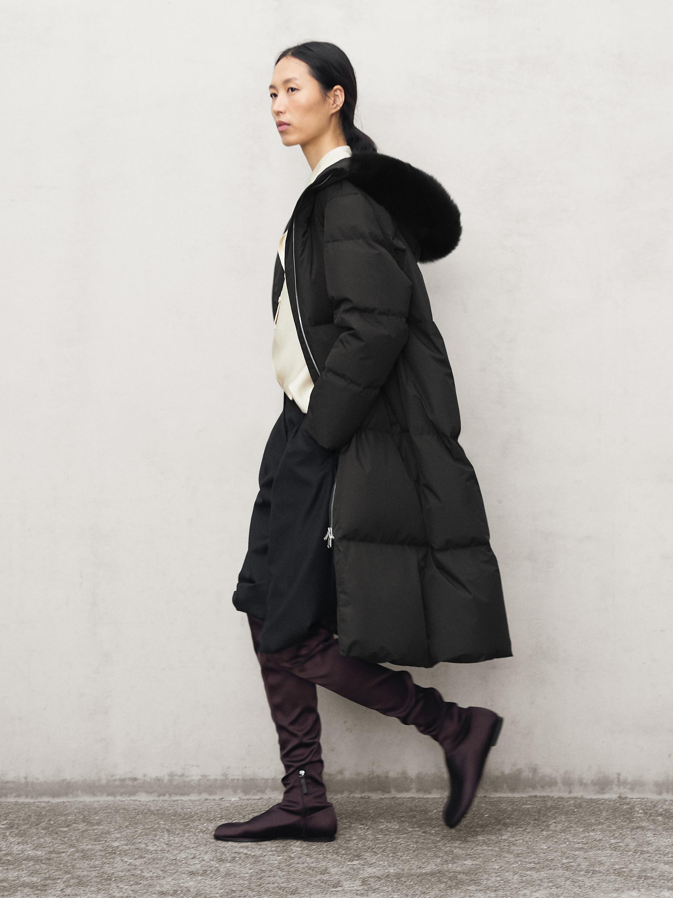 Technical down jacket with faux fur hood