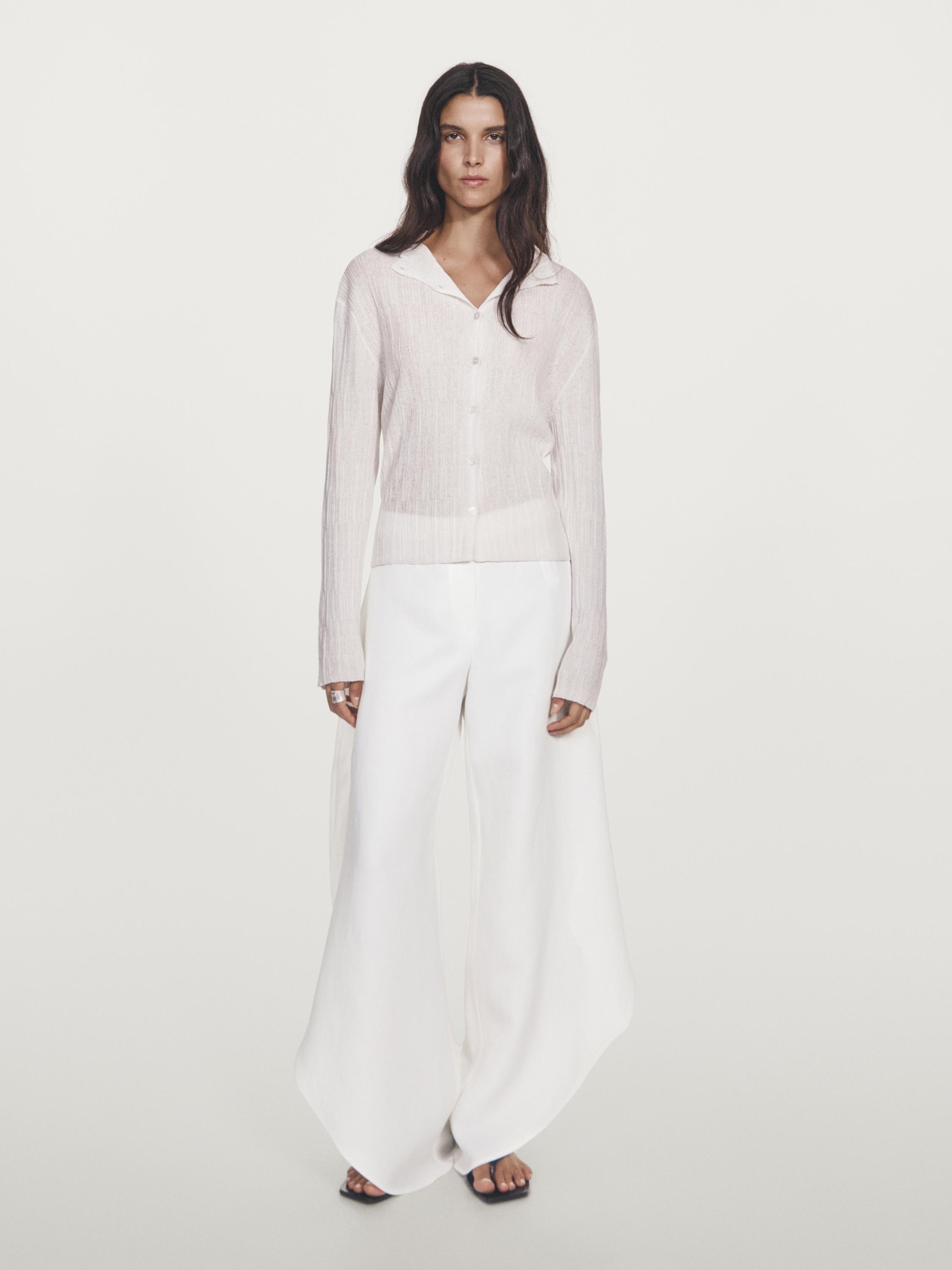 Pantalon fendu dans le bas