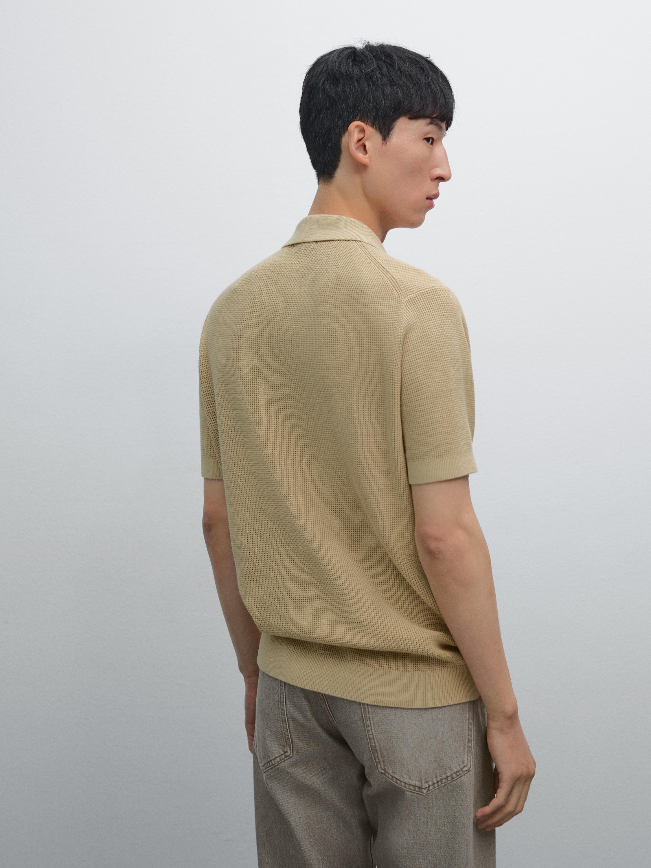 Polo en maille texturée de coton