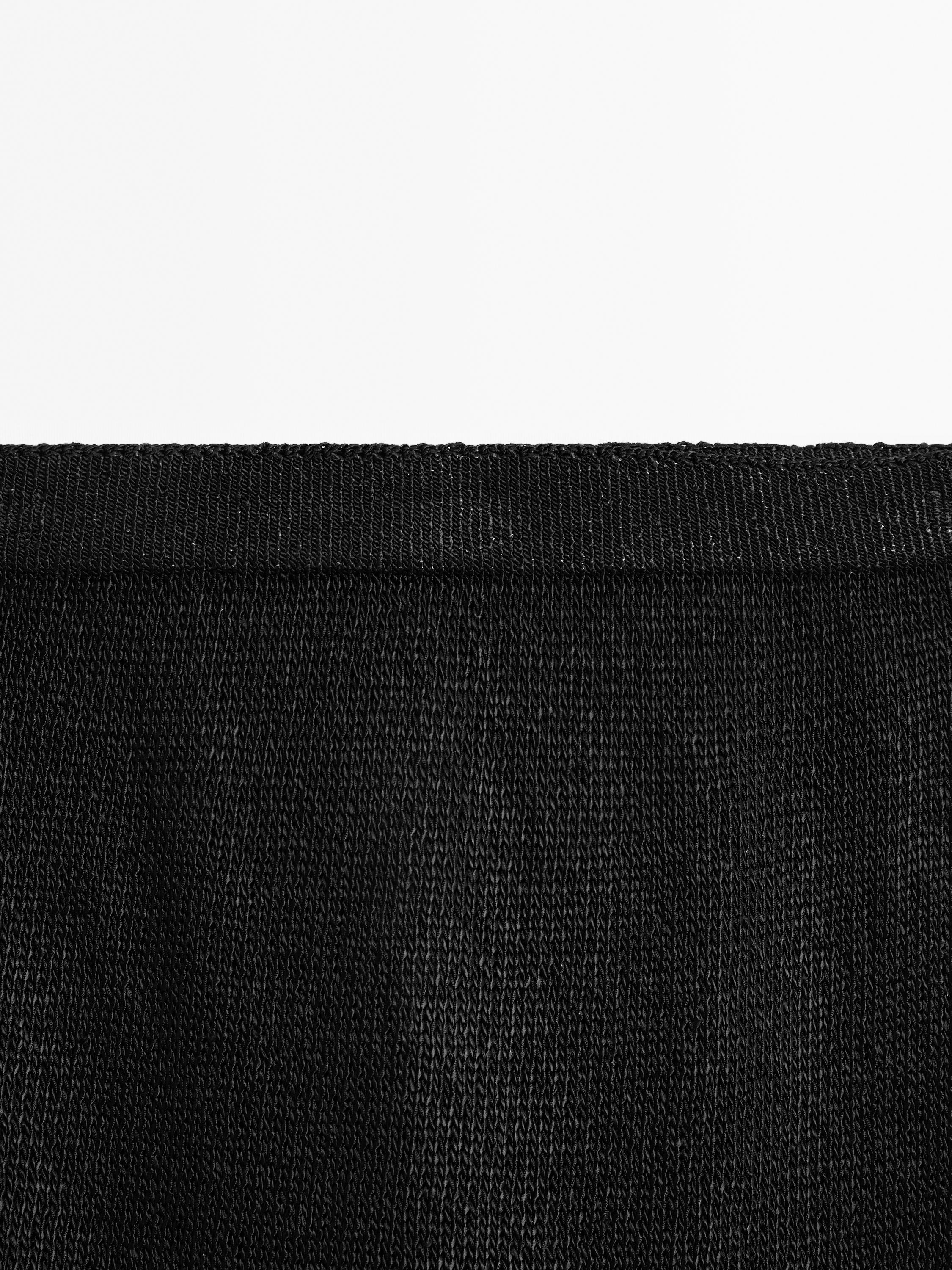 Jupe midi en maille ajourée