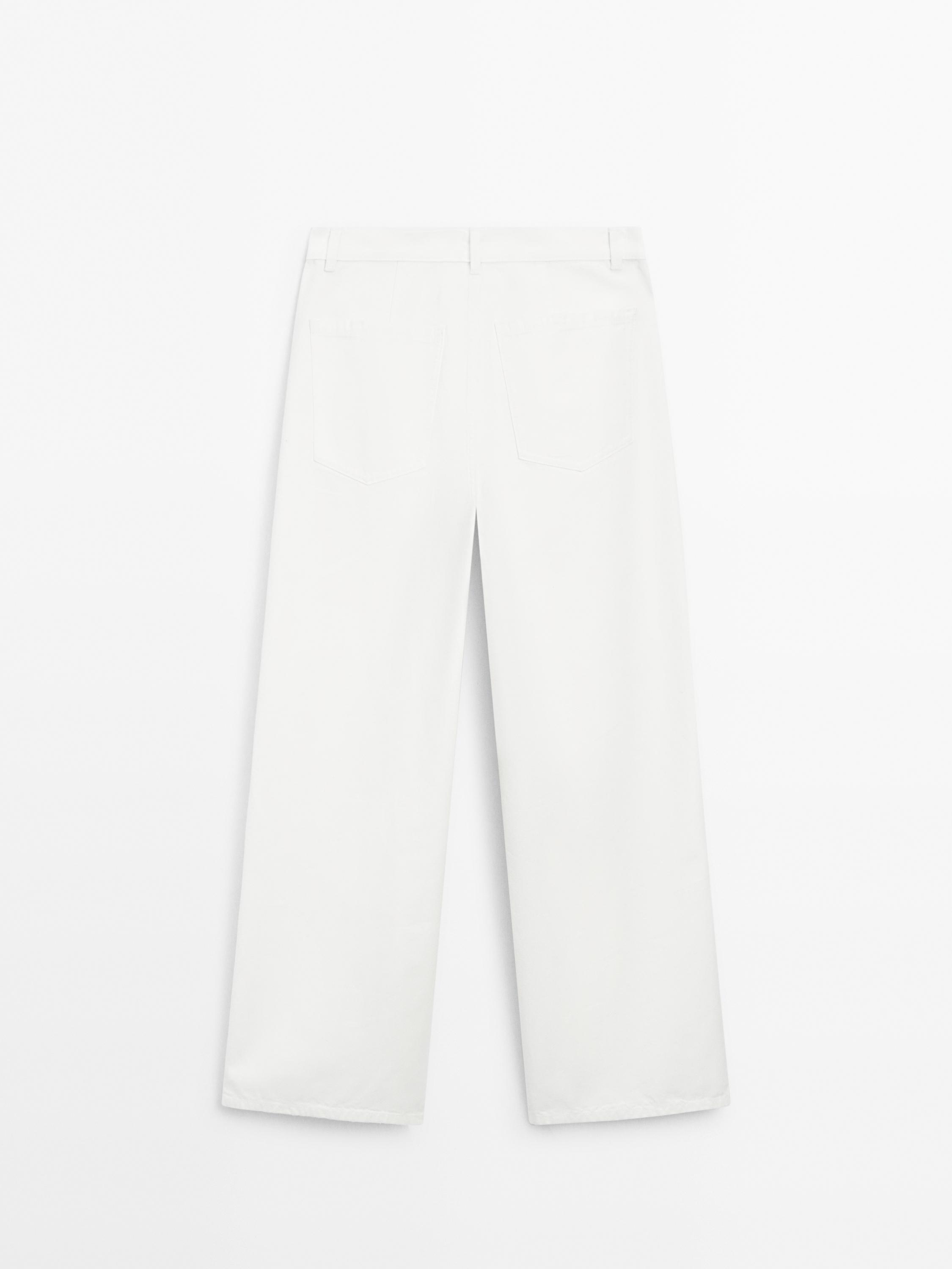 Denim trousers with seam details