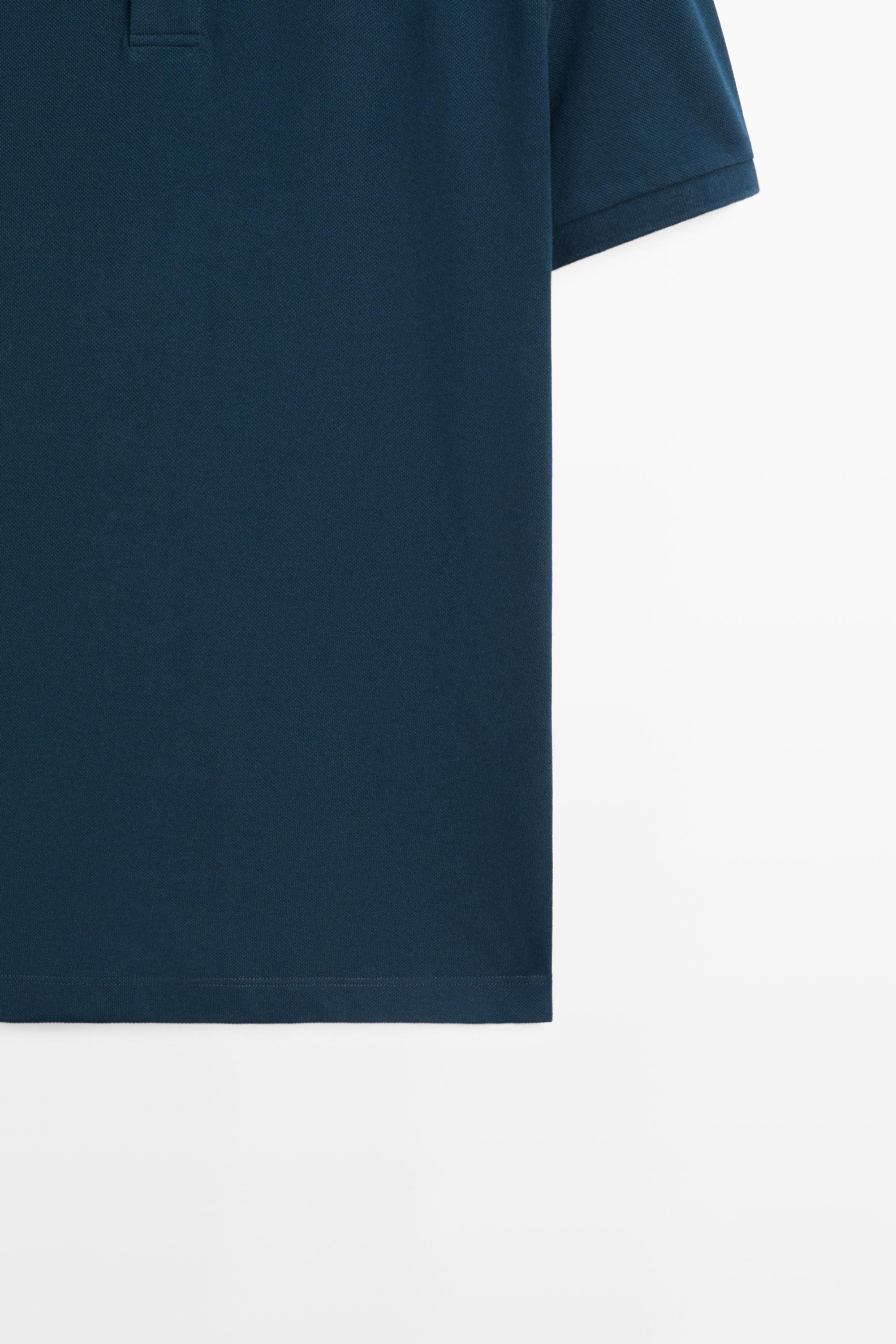 Micro-textured cotton piqué polo shirt — INDIGO
