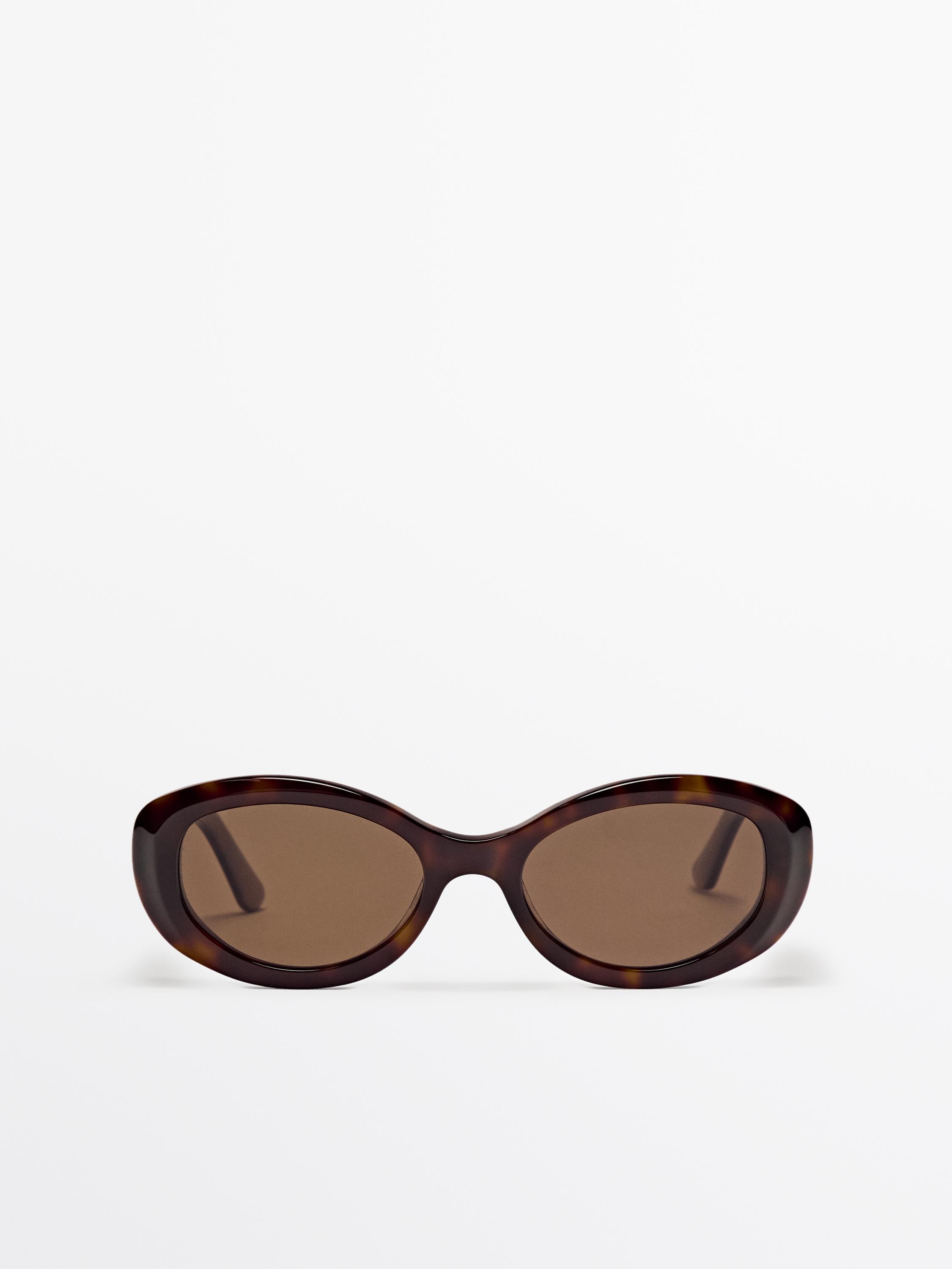 Oval tortoiseshell-effect sunglasses