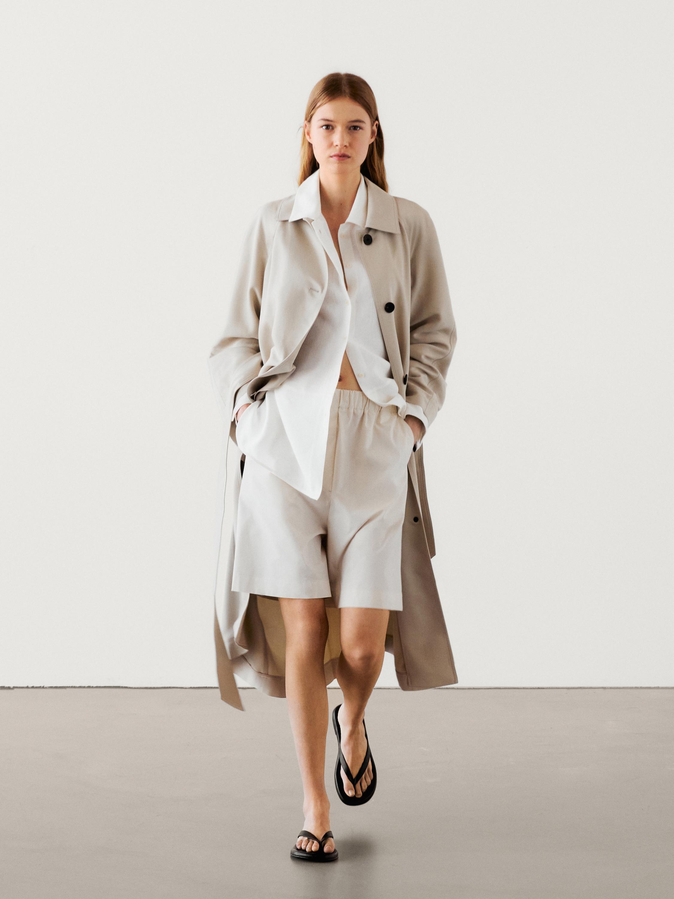 Long flowing trench coat with belt detail