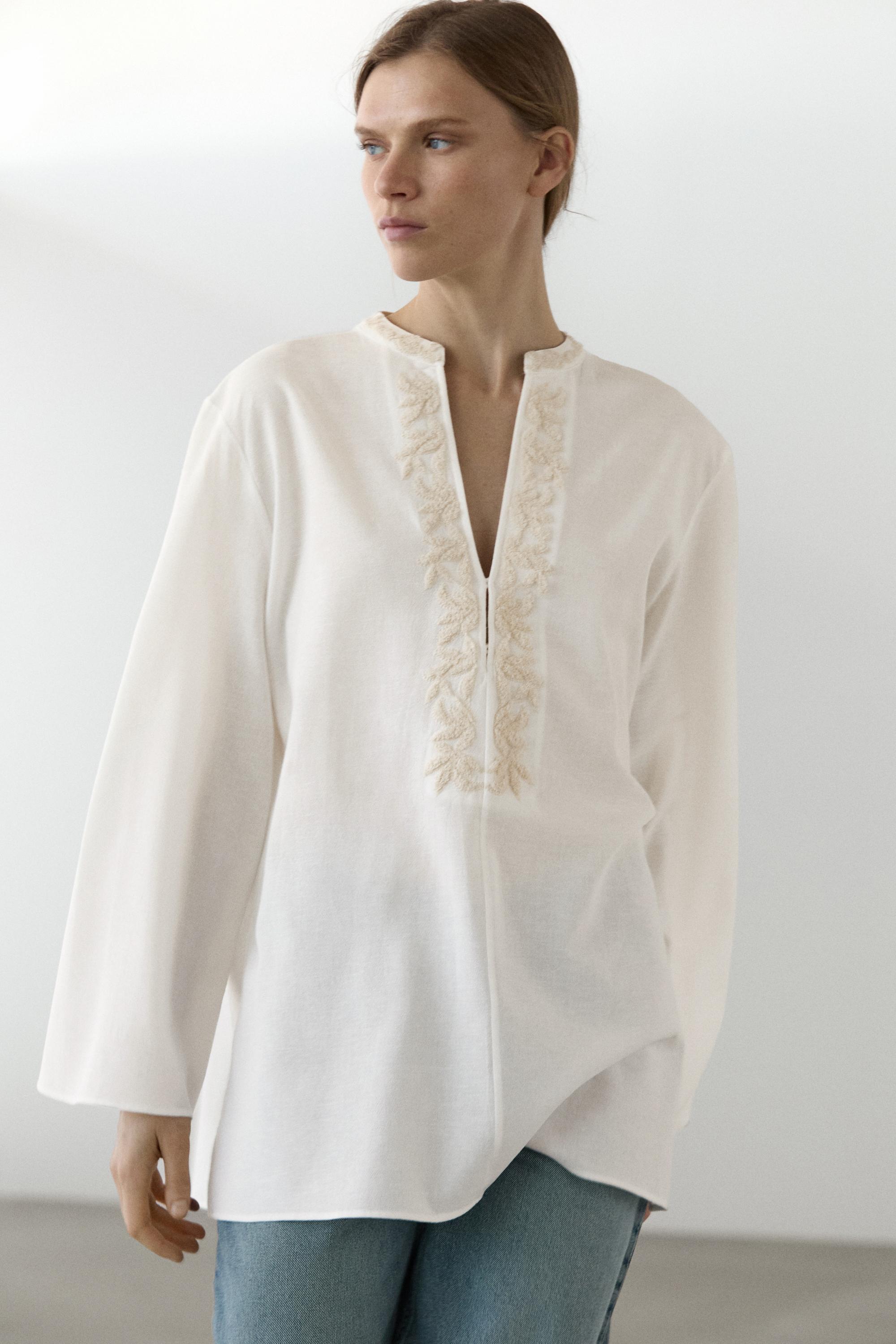 Flowing oversize blouse with stand collar and embroidery — CREAM