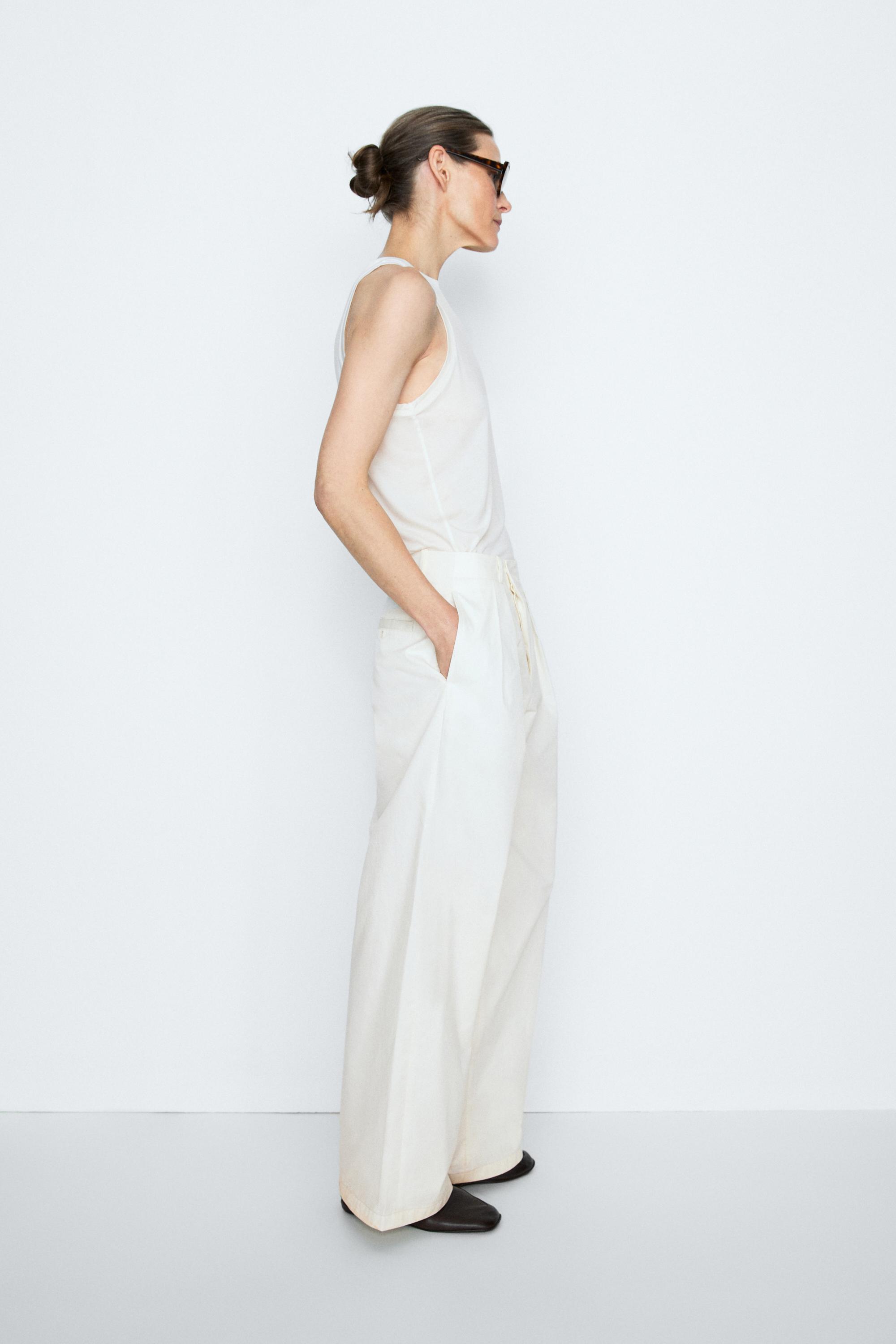 Pleated pants with crossover fastening detail - STUDIO — CREAM