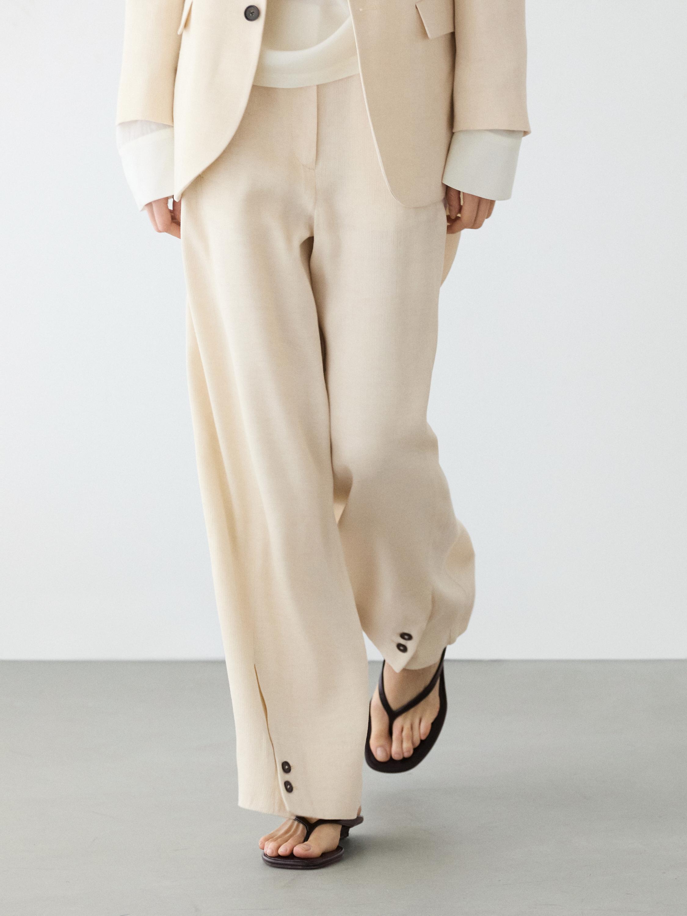 Linen blend suit trousers with button detail — CREAM
