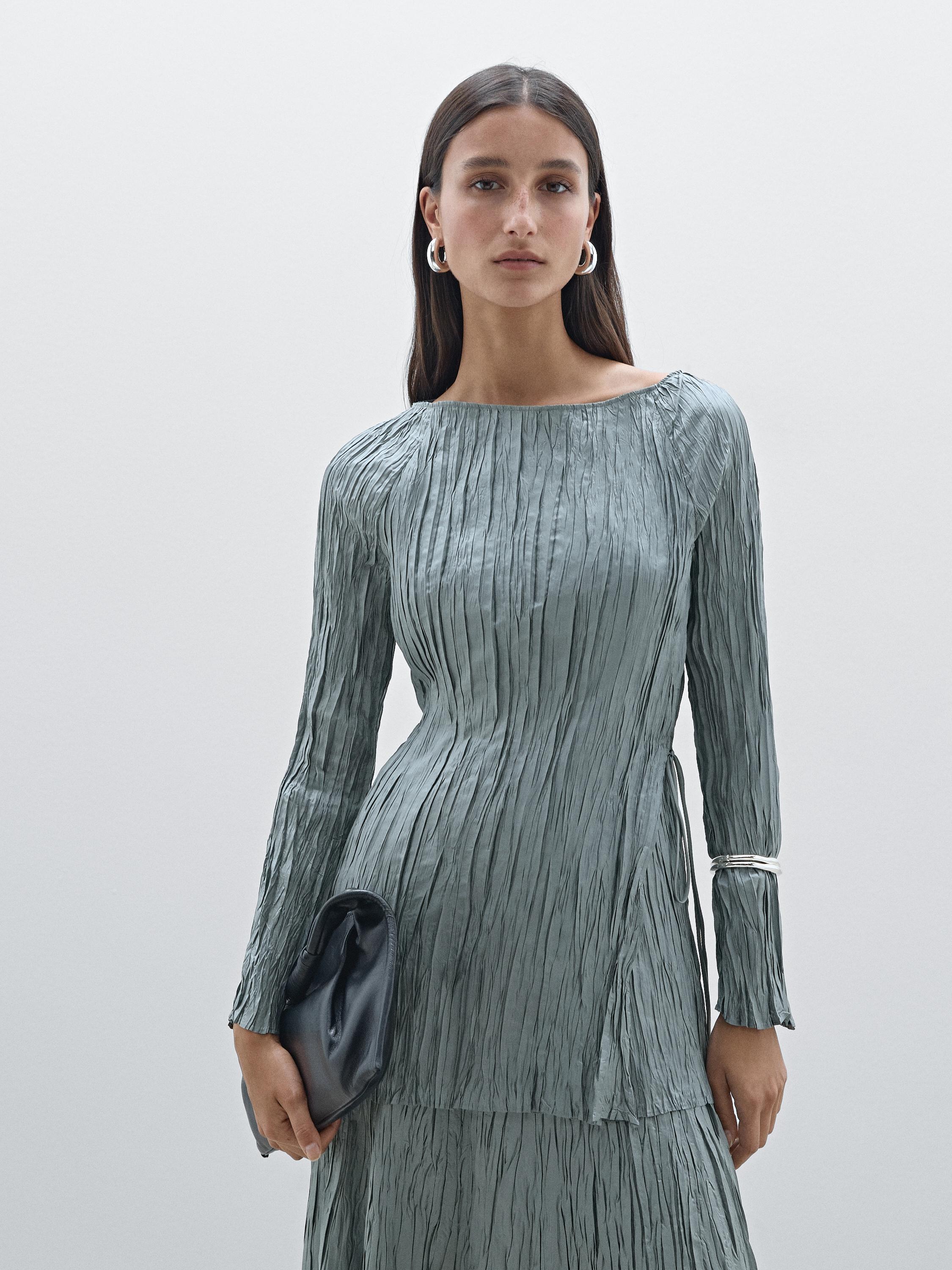 Long sleeve top with crossover fastening