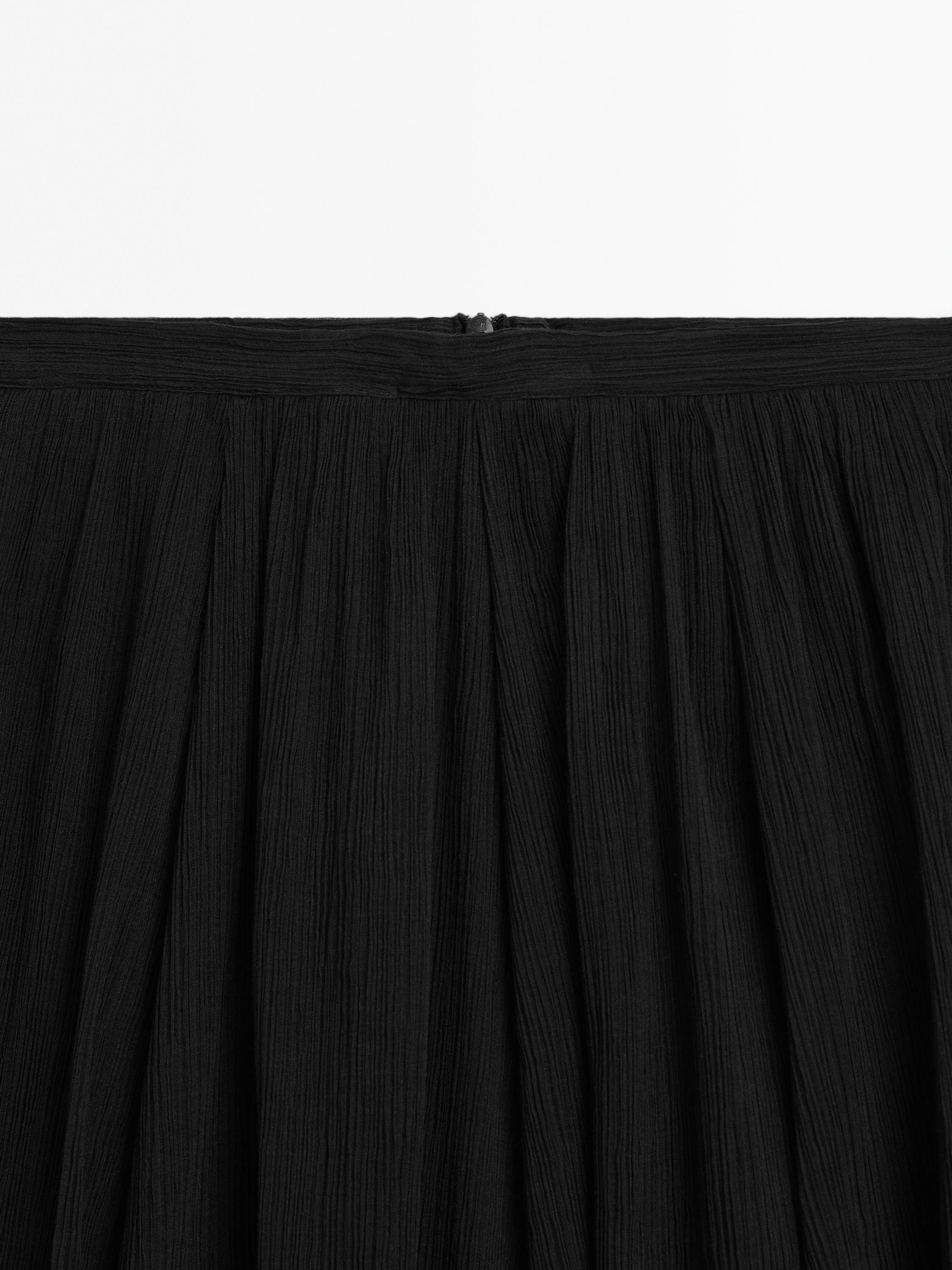 Voluminous pleated midi skirt