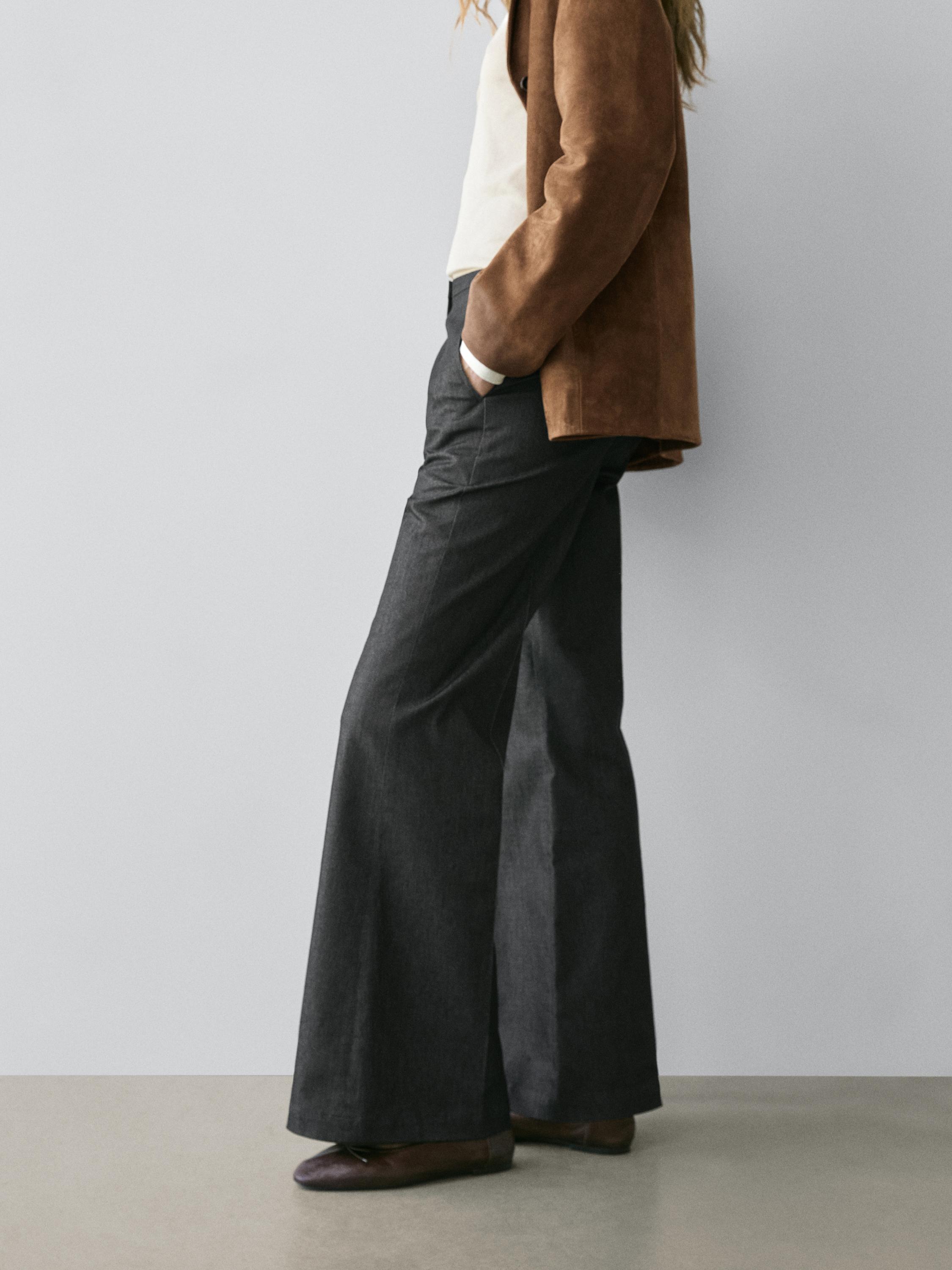 Denim-effect flared trousers — BLACK
