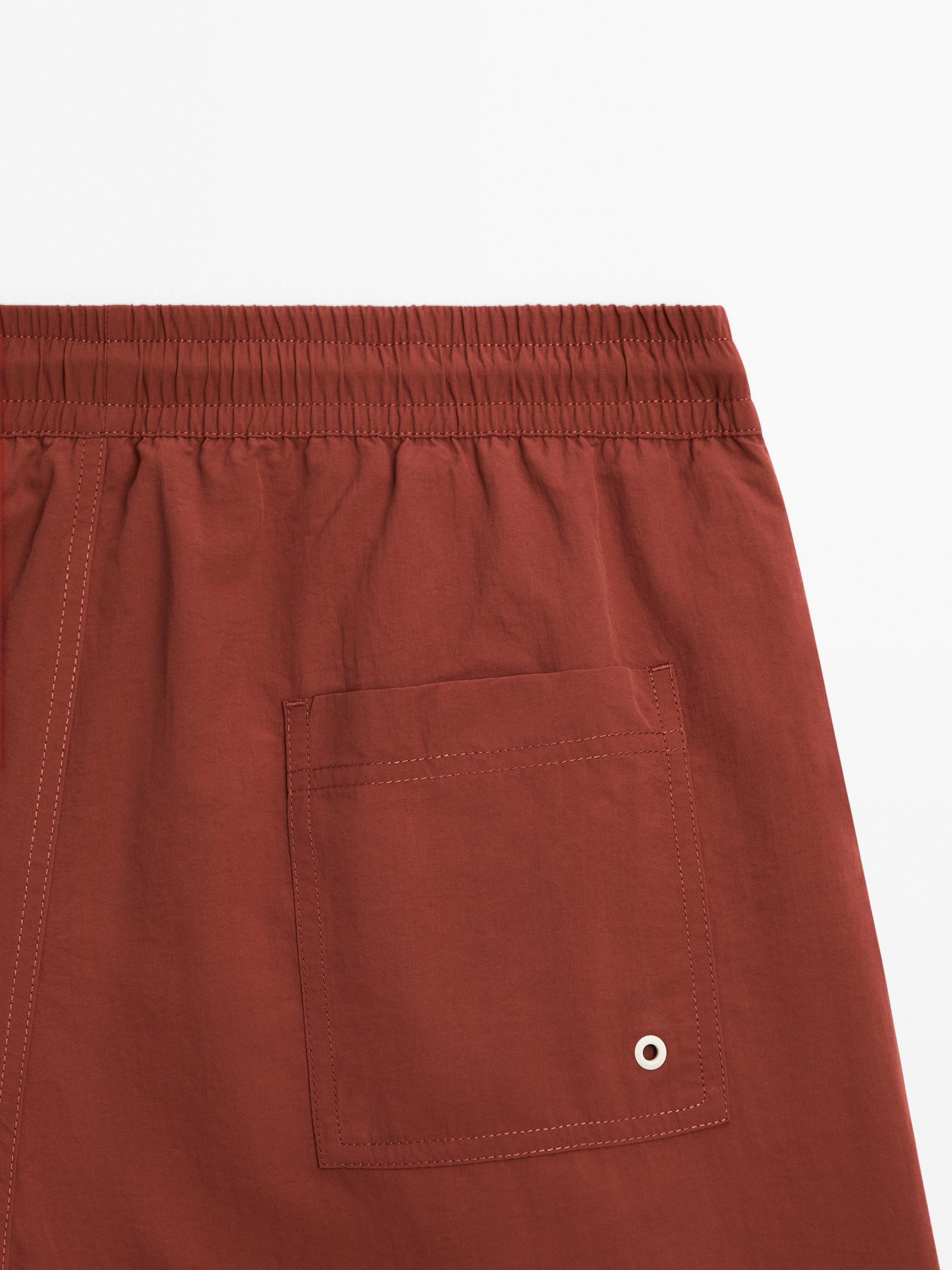 Plain regular fit swimming trunks
