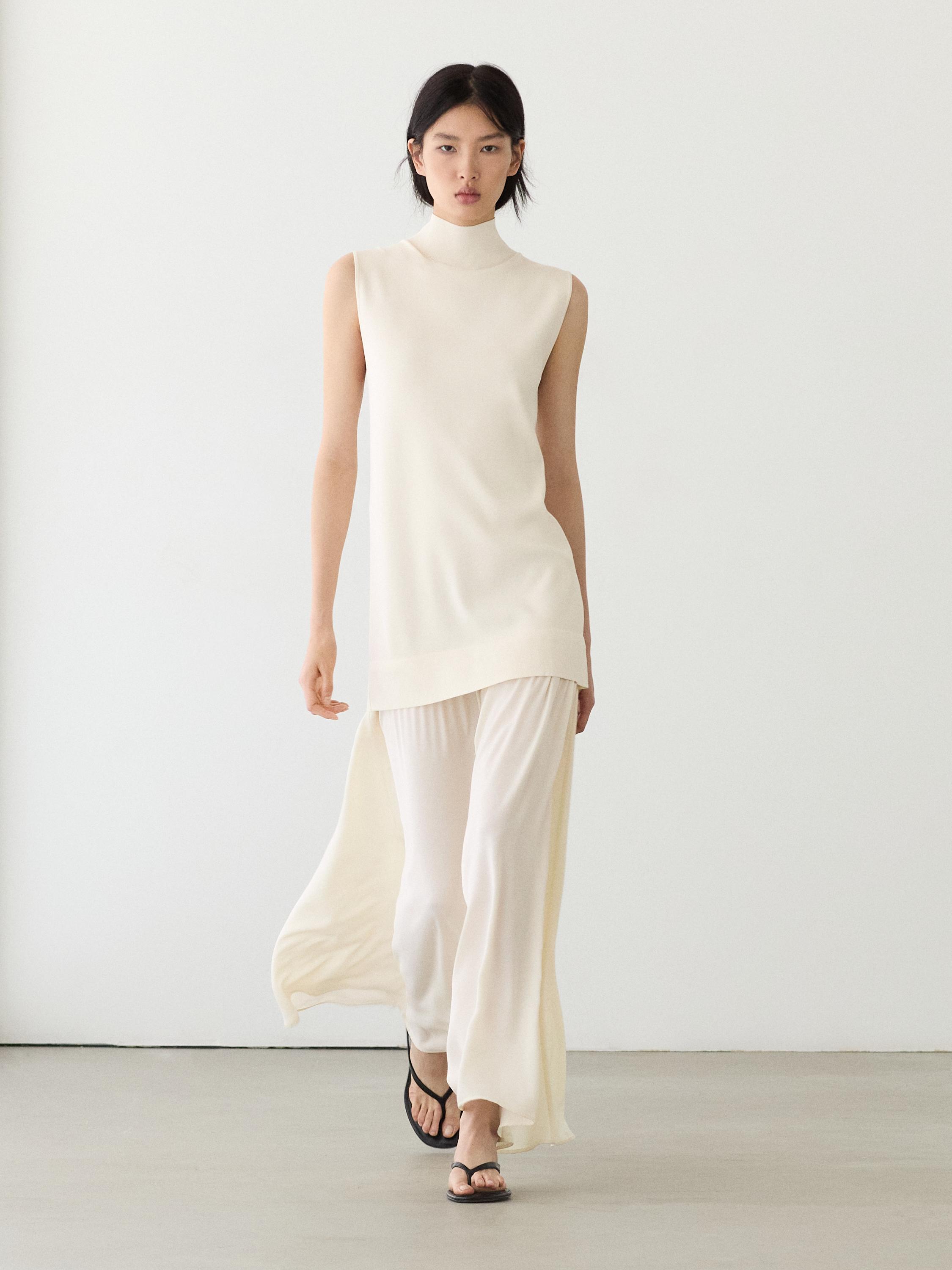 Трикотажна сукня міді комбінована