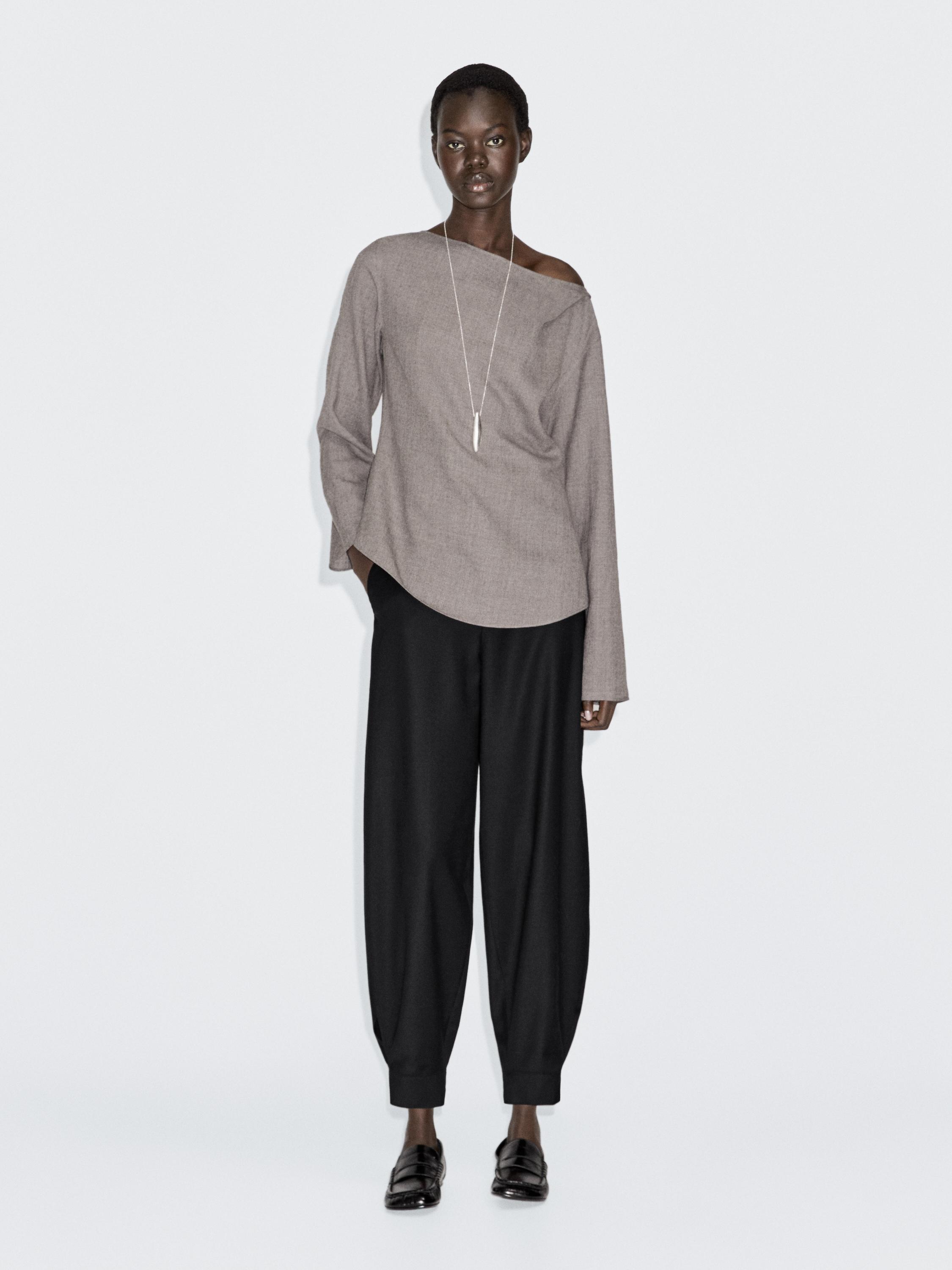 Blusa itsasontzi-lepoarekin, artilearekin