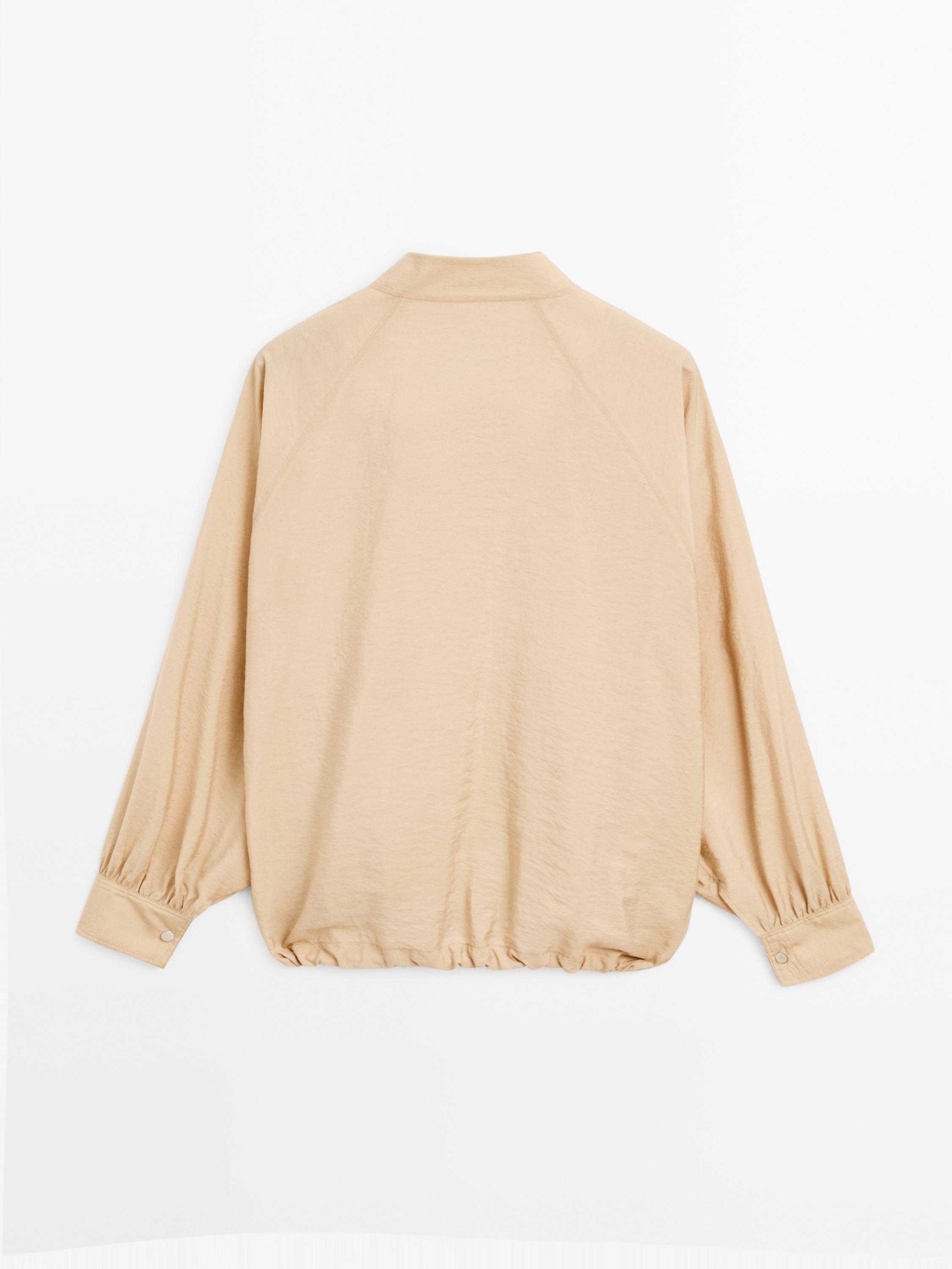 Loose-fitting bomber jacket with drawstring detail