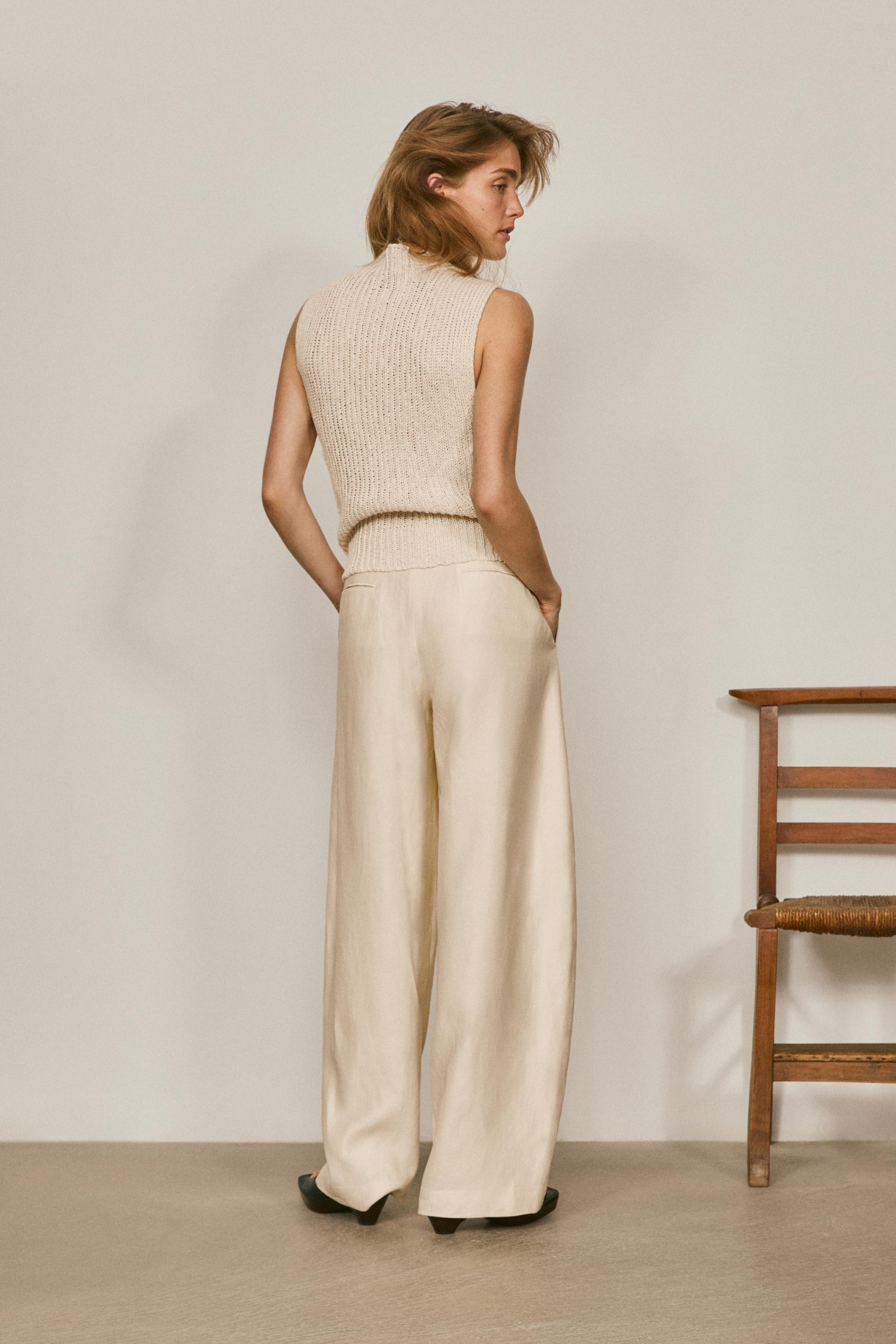 Wide-leg trousers with pleated details - LIMITED EDITION — Off white