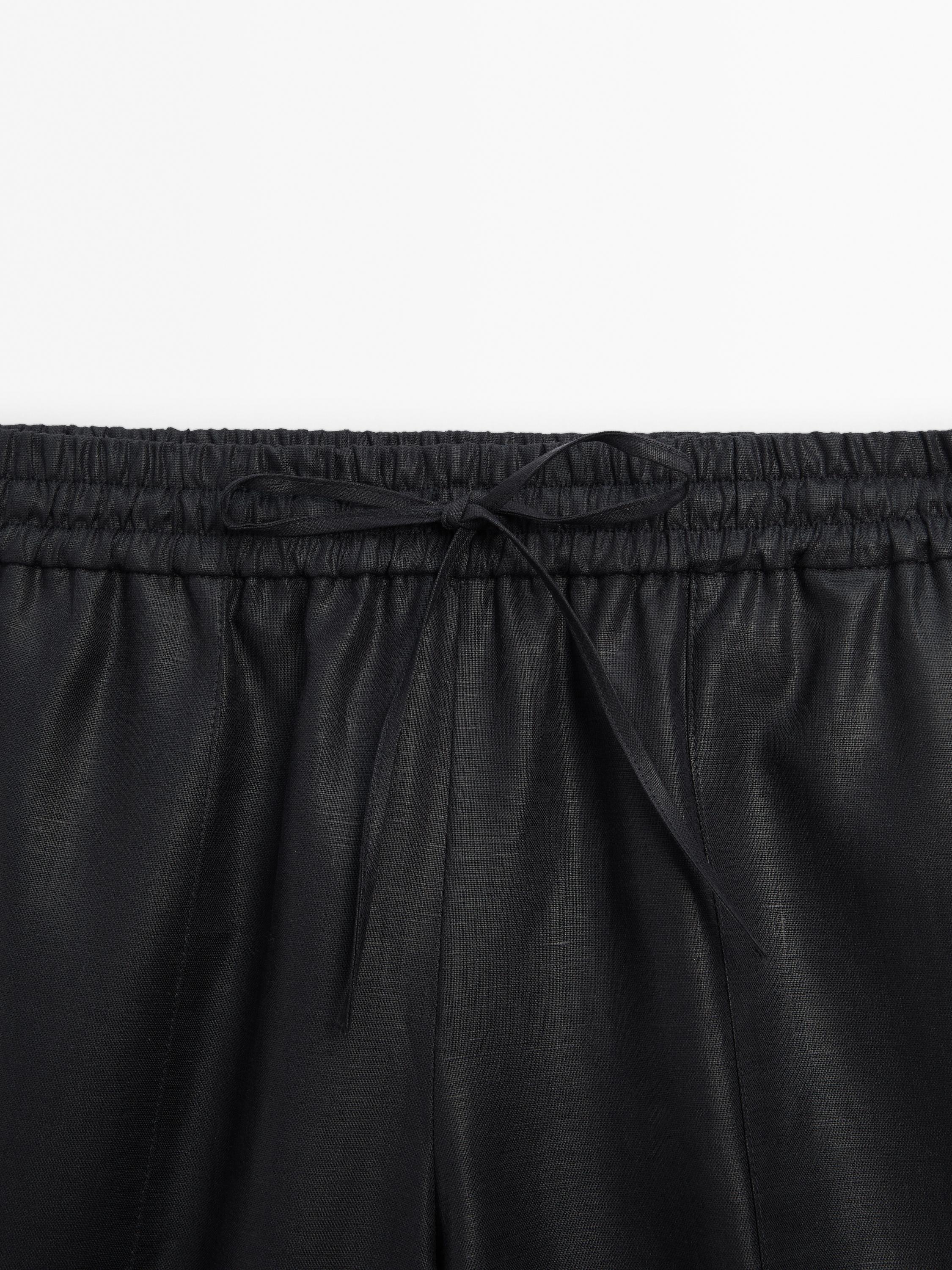 Waxed 100% linen wide-leg jogger trousers