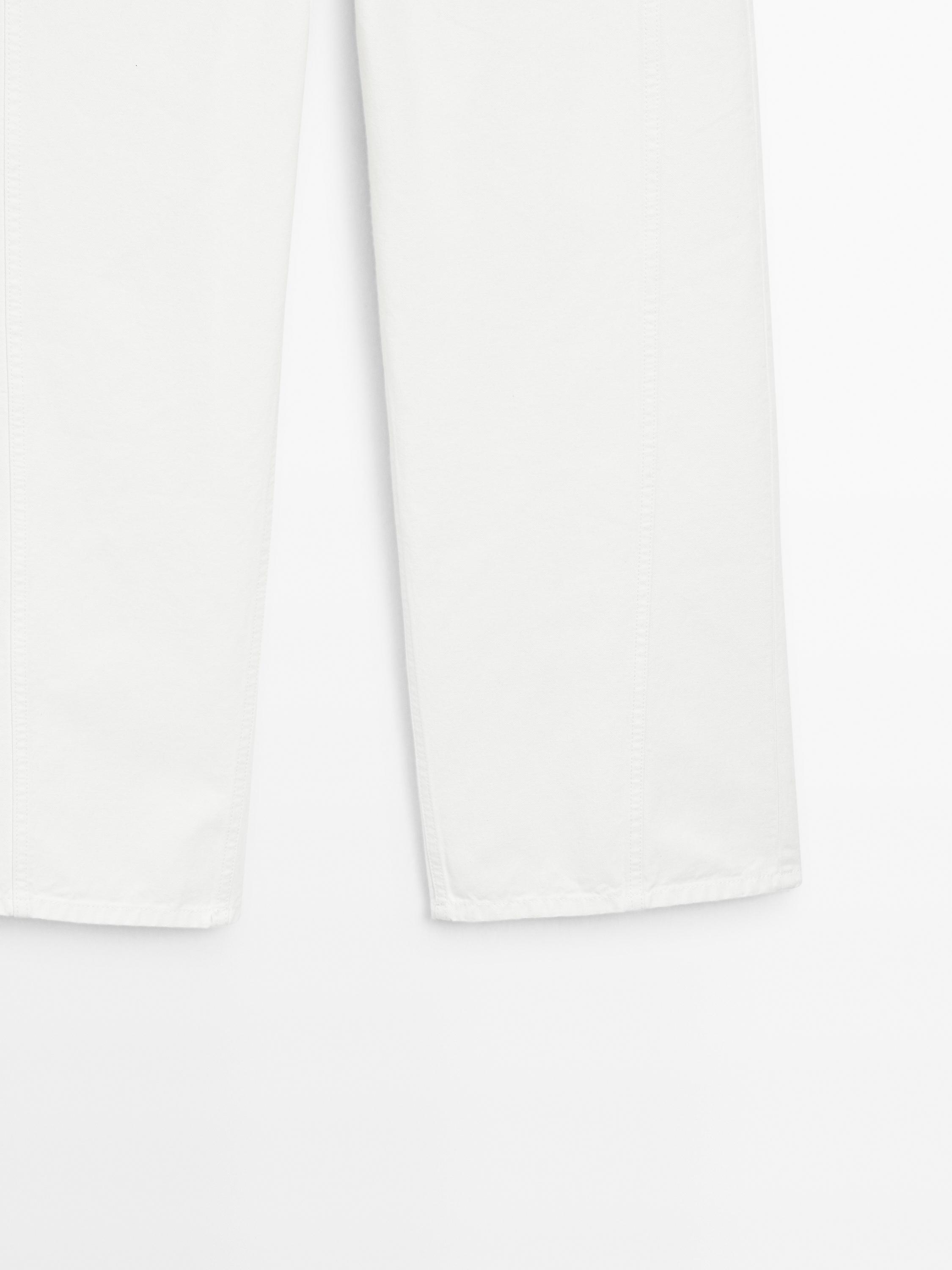 Denim trousers with seam details