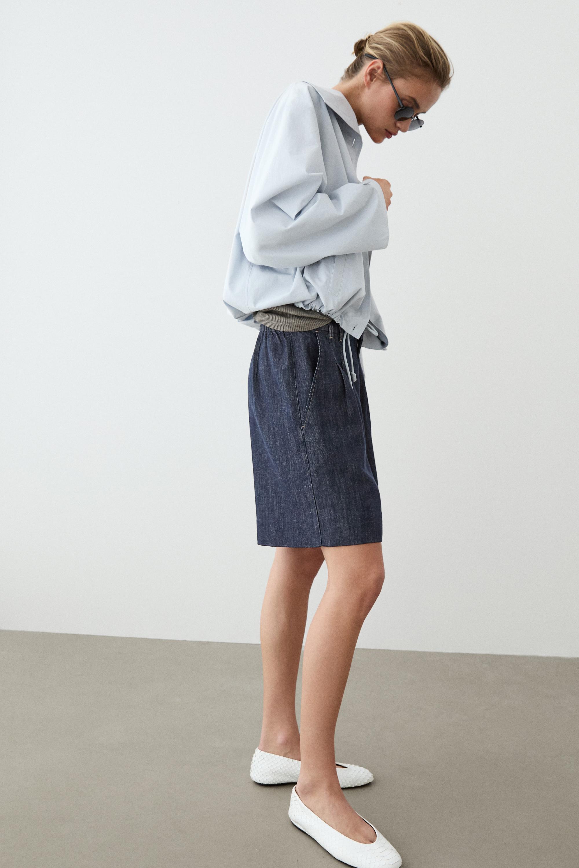Cotton denim Bermuda shorts with topstitching — DARK BLUE