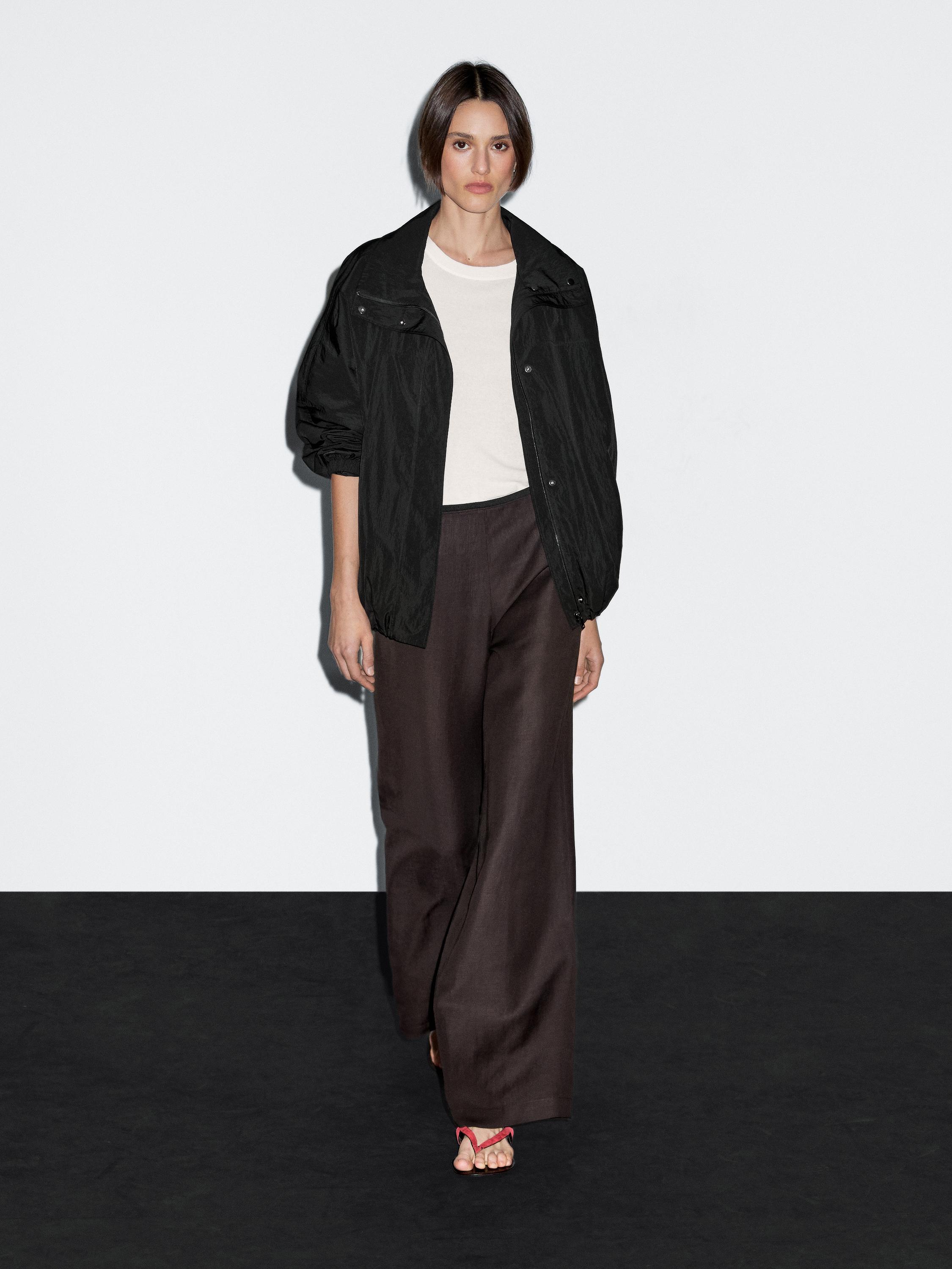 Veste technique bouffante à col montant