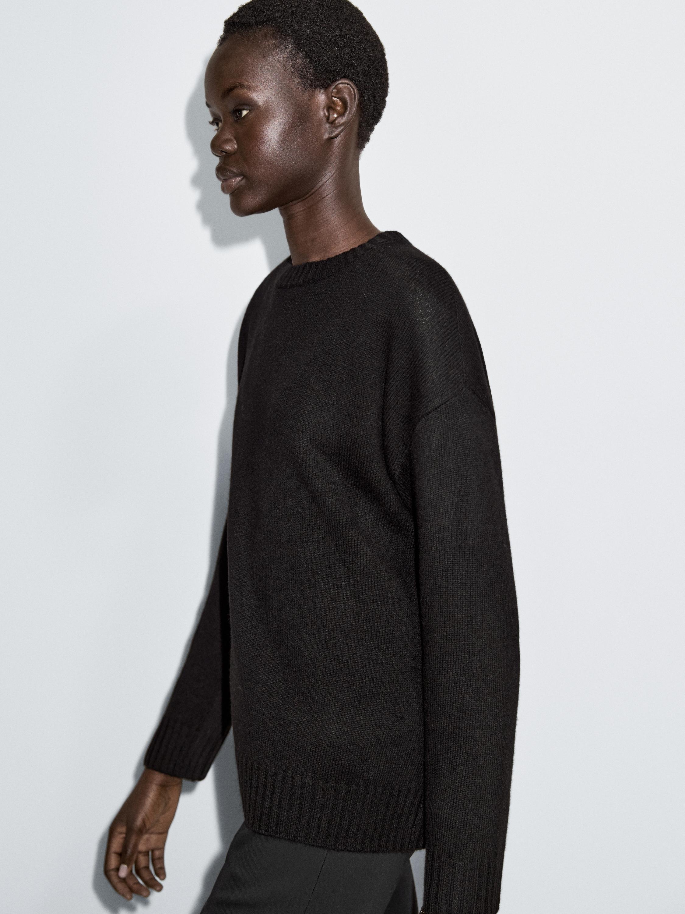 Flared trousers with pocket — BLACK