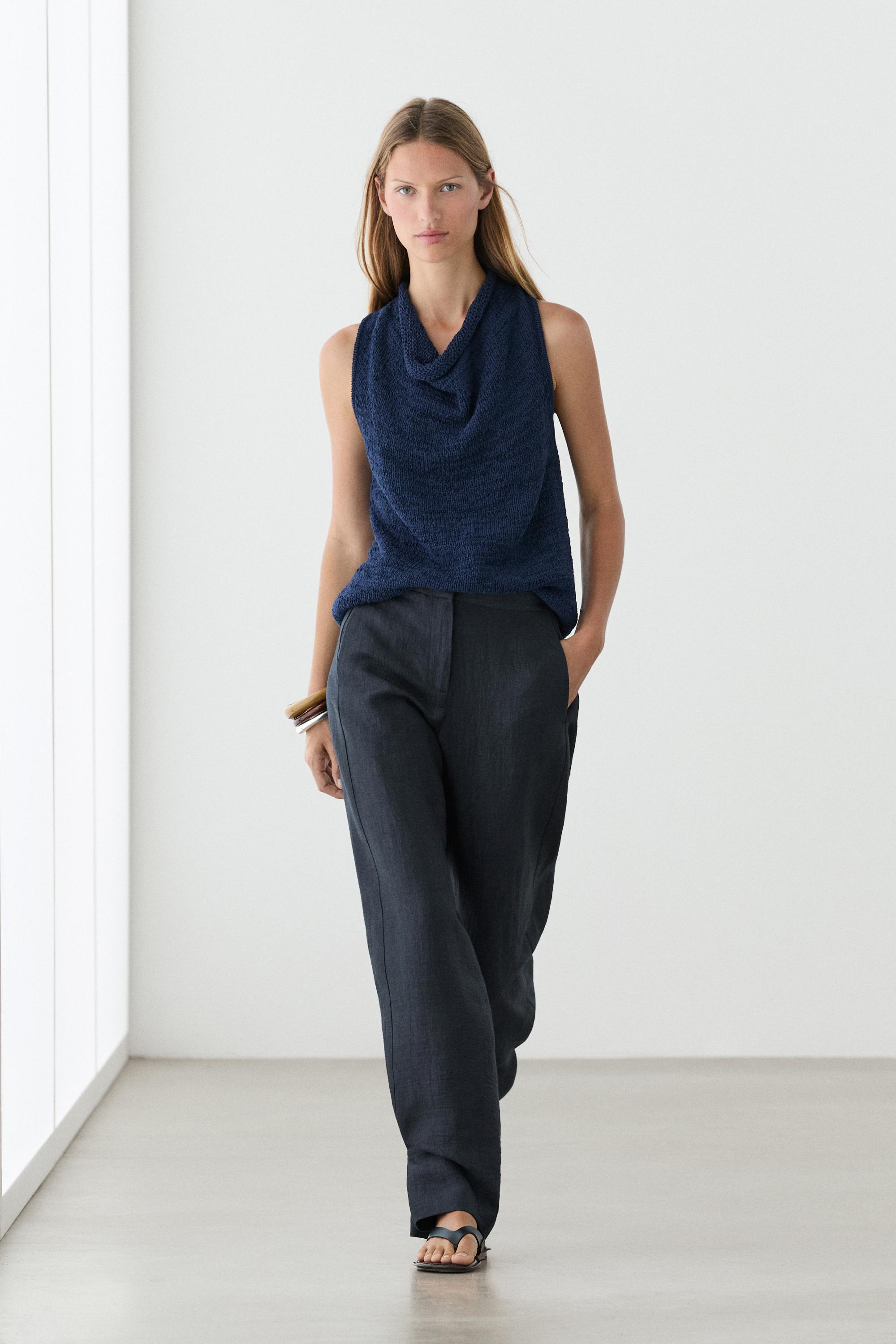 Trousers with gathered hems