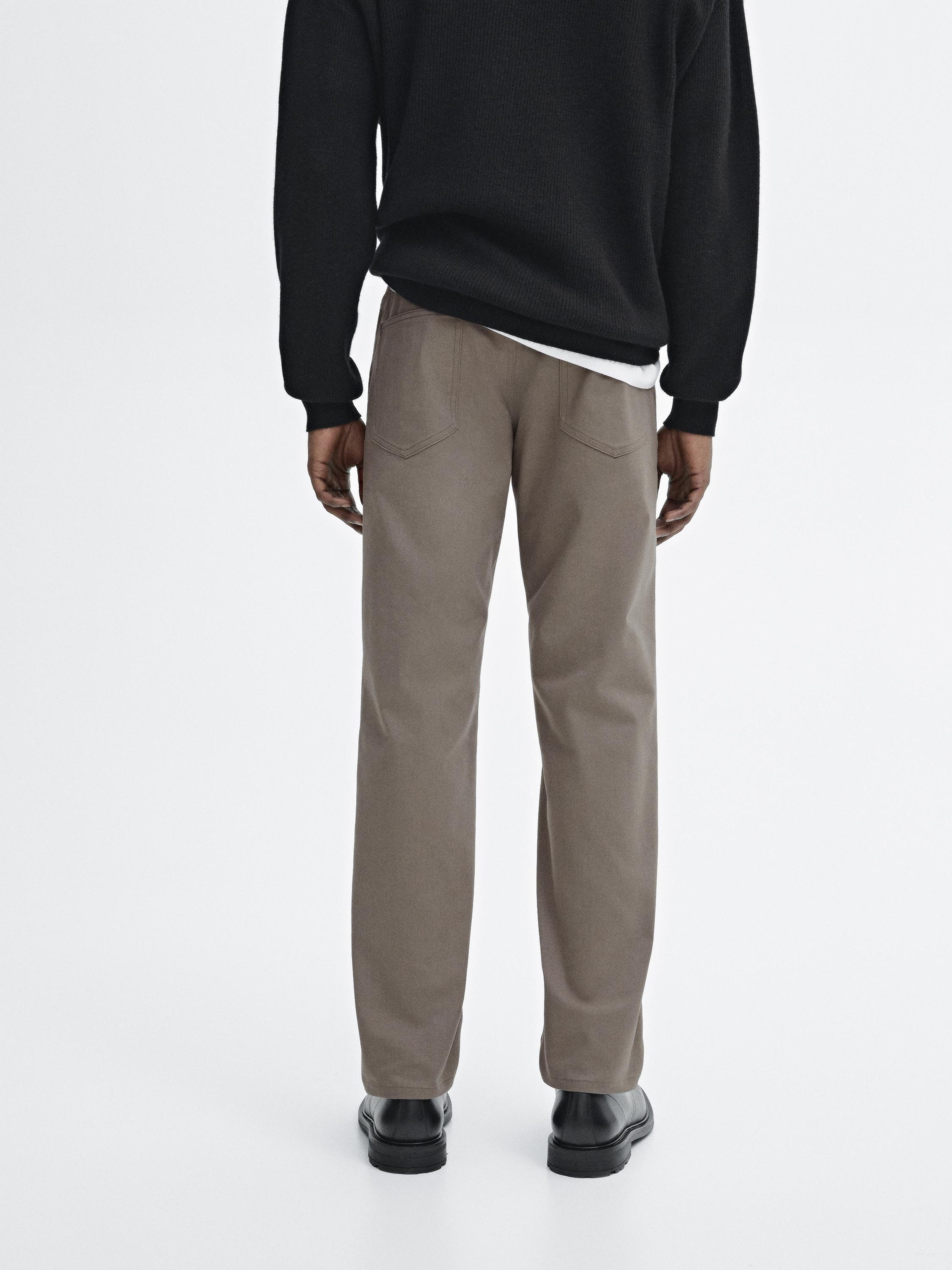 Cotton blend tapered fit jeans