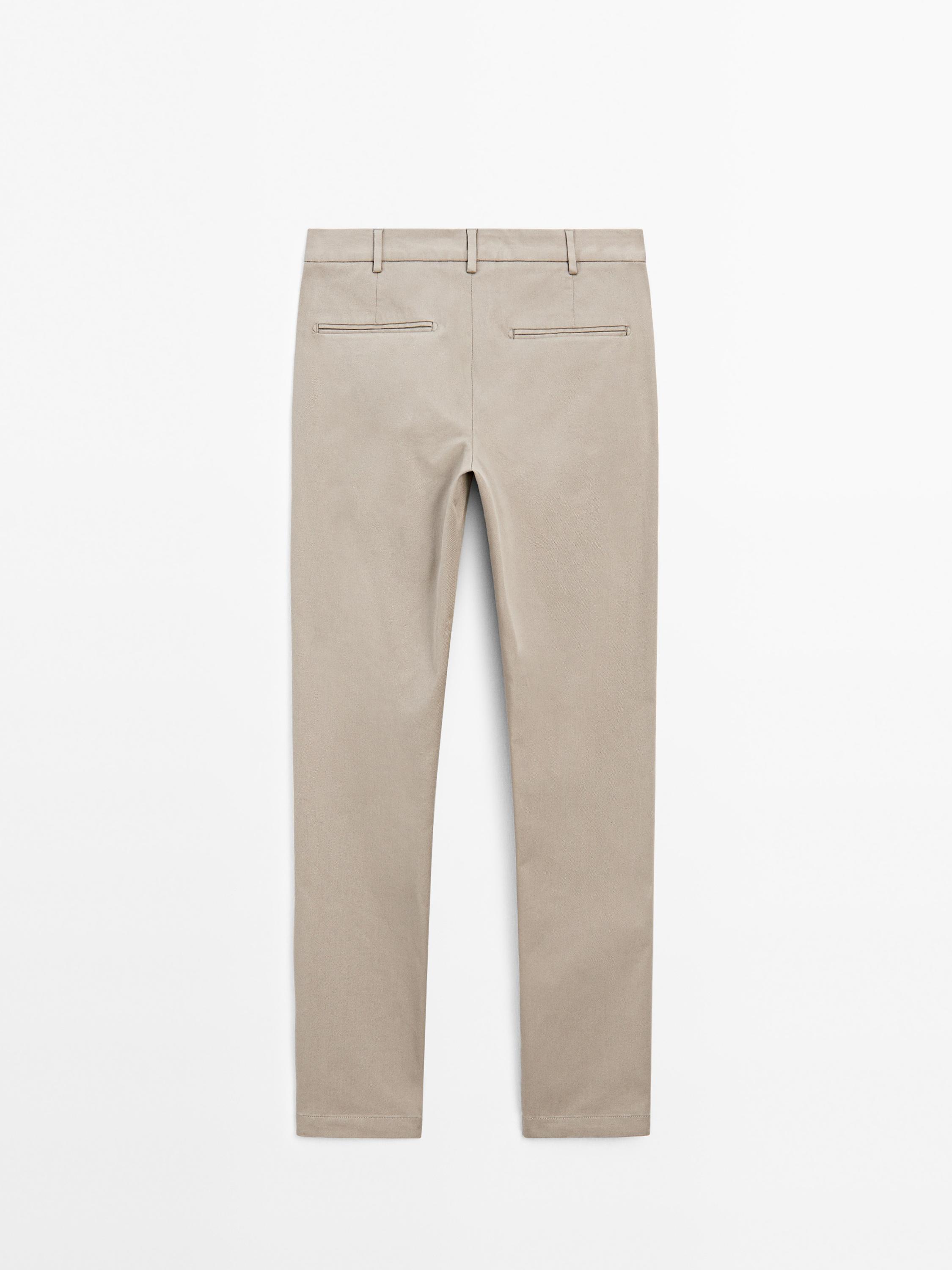 Cotton blend textured slim fit trousers