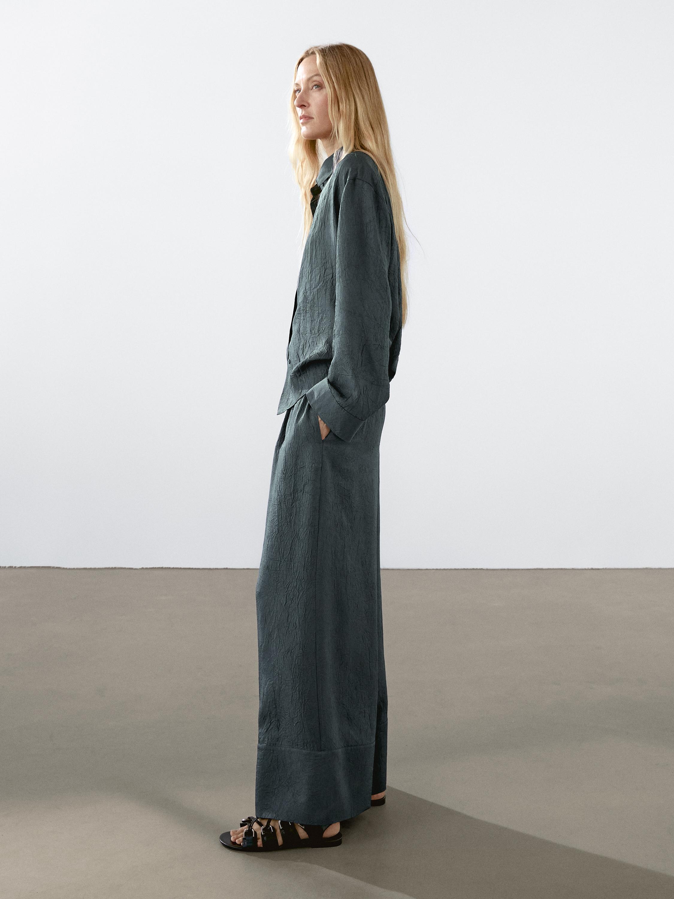 Flowing creased-effect trousers