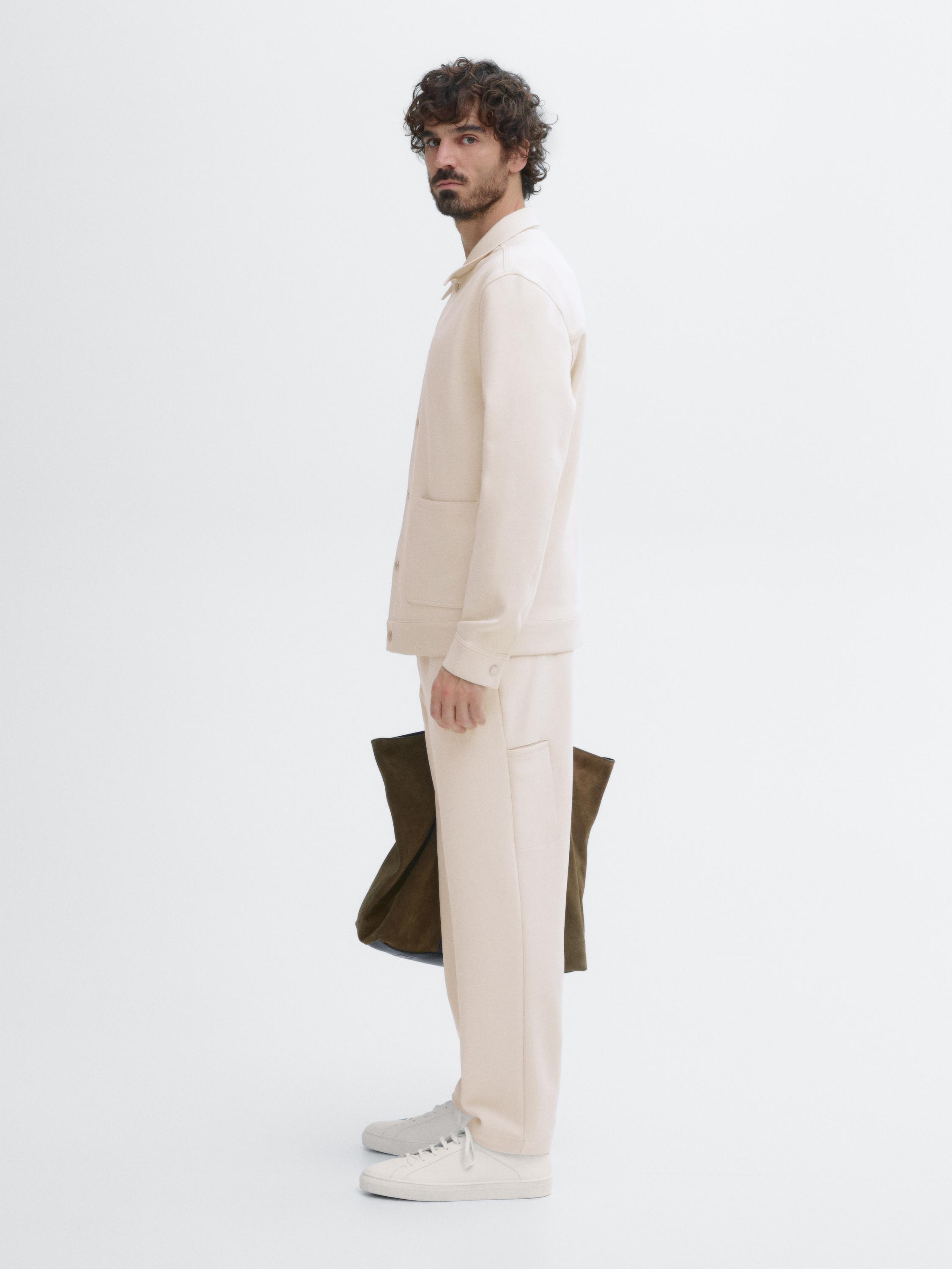 Trousers with side pocket detail
