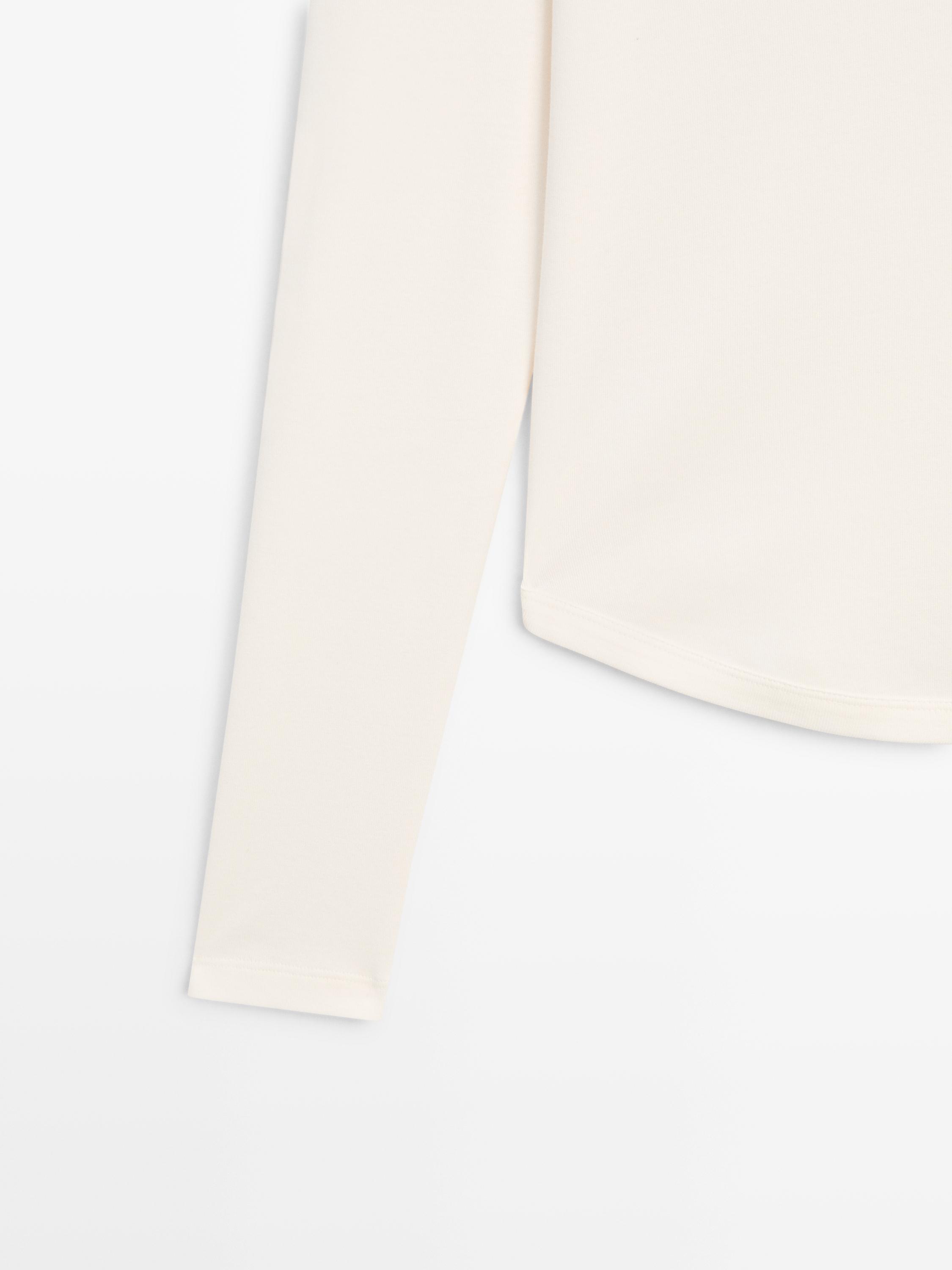 Langarmshirt mit abgerundetem Saum