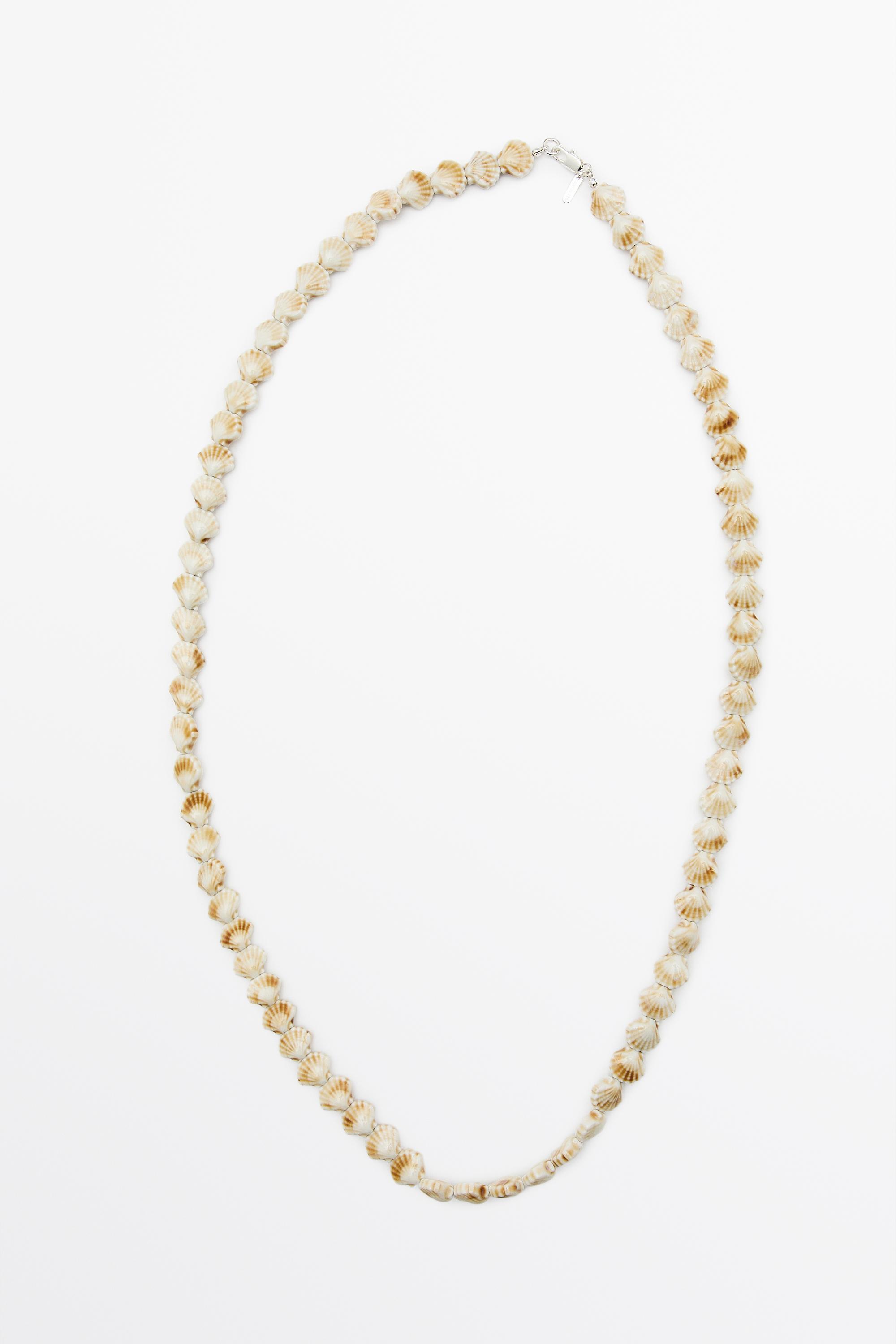 Ceramic seashell necklace — CREAM