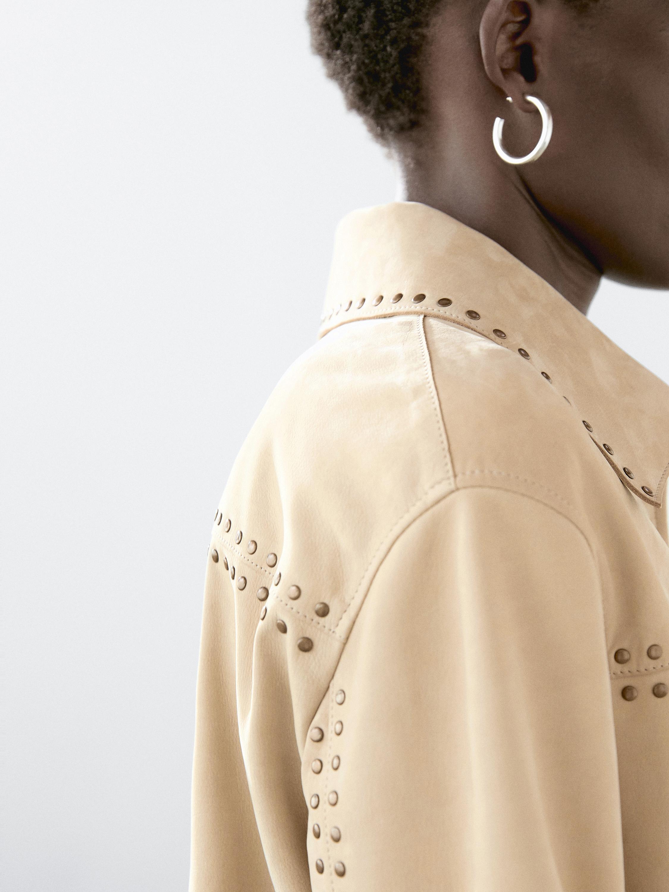 Short leather jacket with stud details