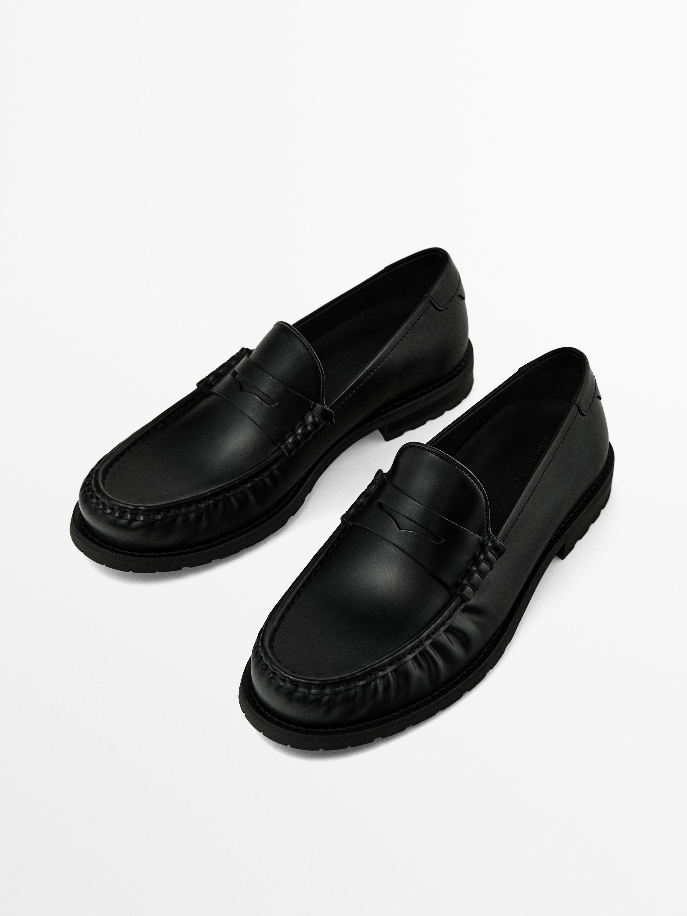 Black leather loafers