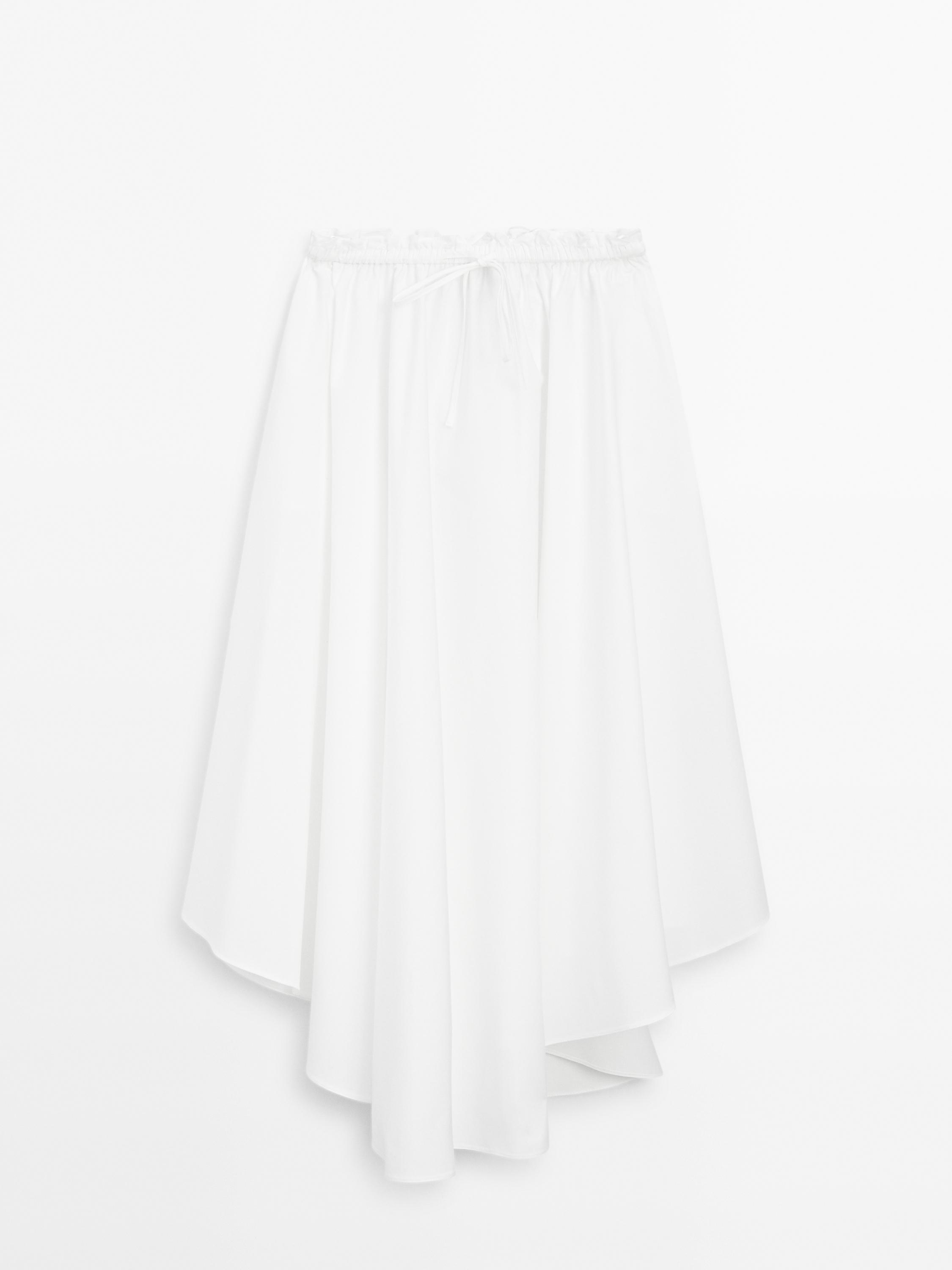 Luźna asymetryczna spódnica średniej długości