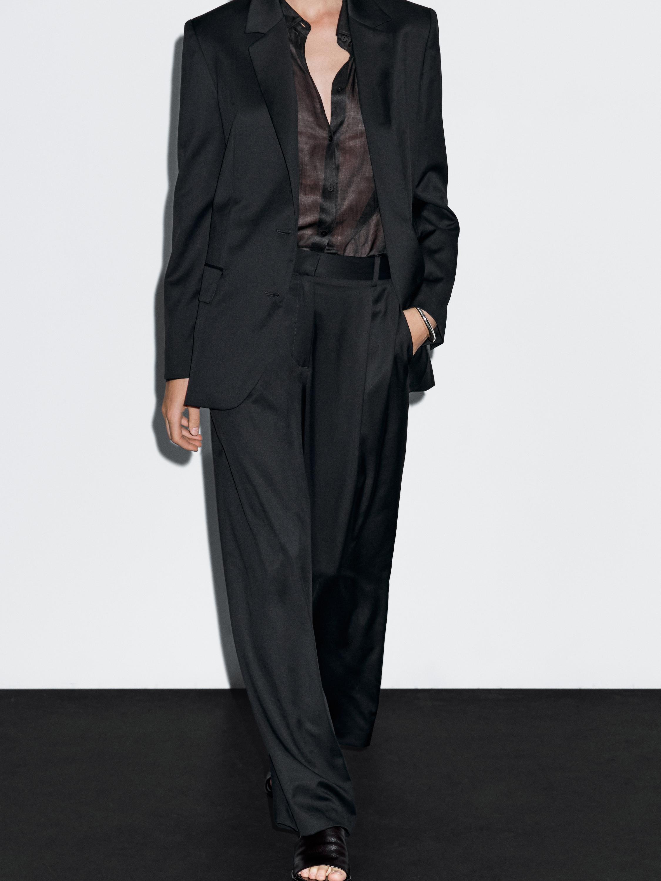 100% extra fine wool pleated trousers